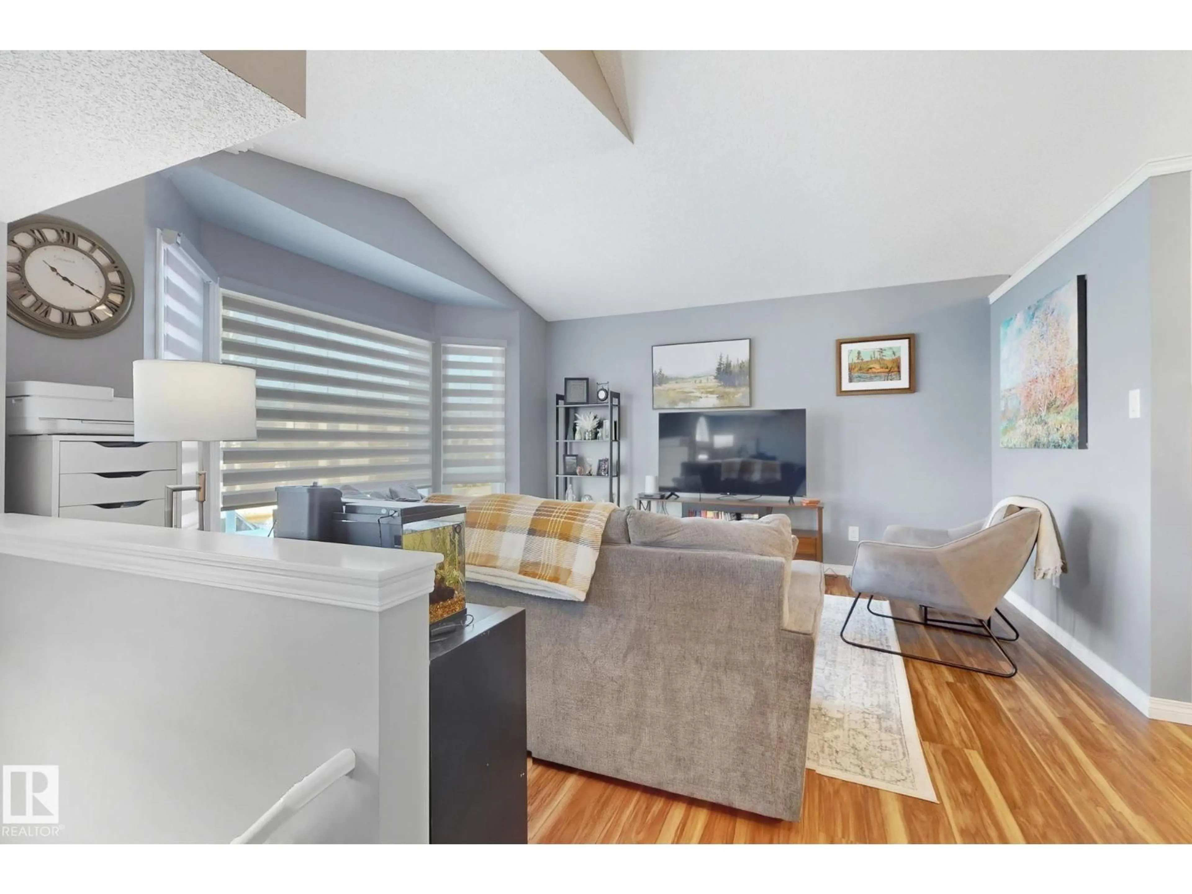 Living room with furniture, unknown for 4515 149 AV, Edmonton Alberta T5Y2Y9