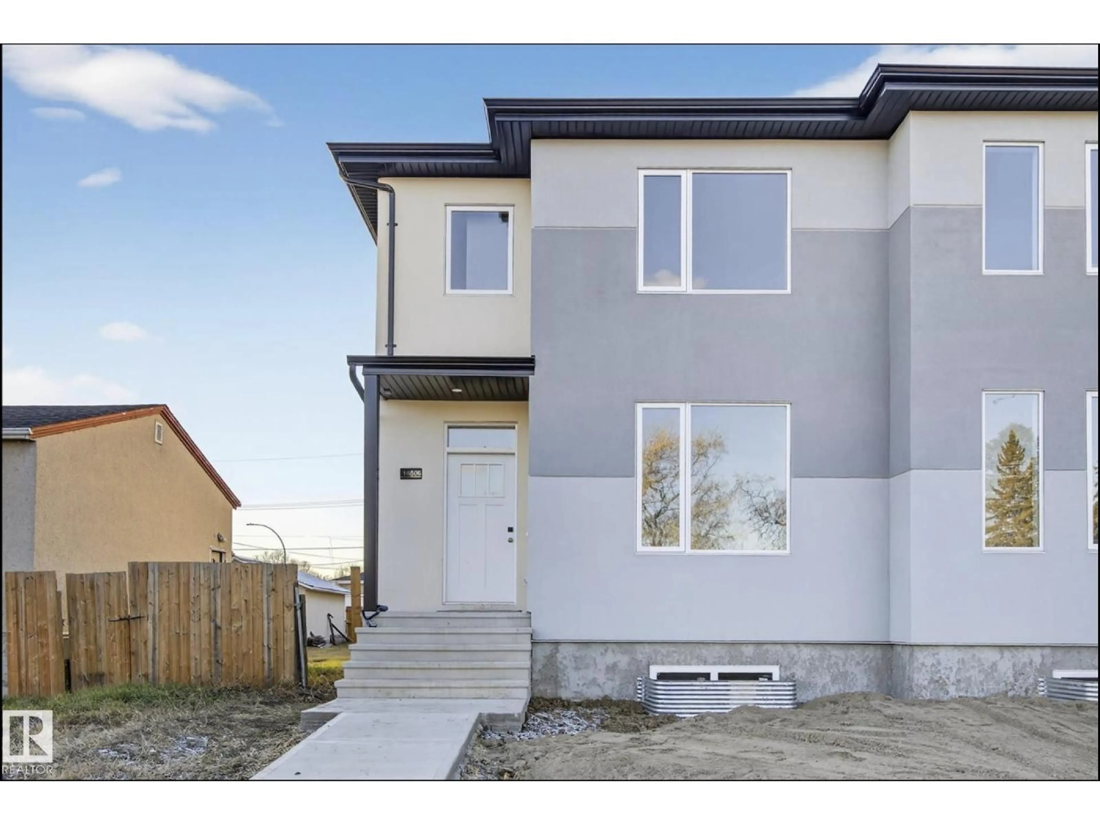 Home with vinyl exterior material, street for NW - 10506 162 ST, Edmonton Alberta T5P3M5
