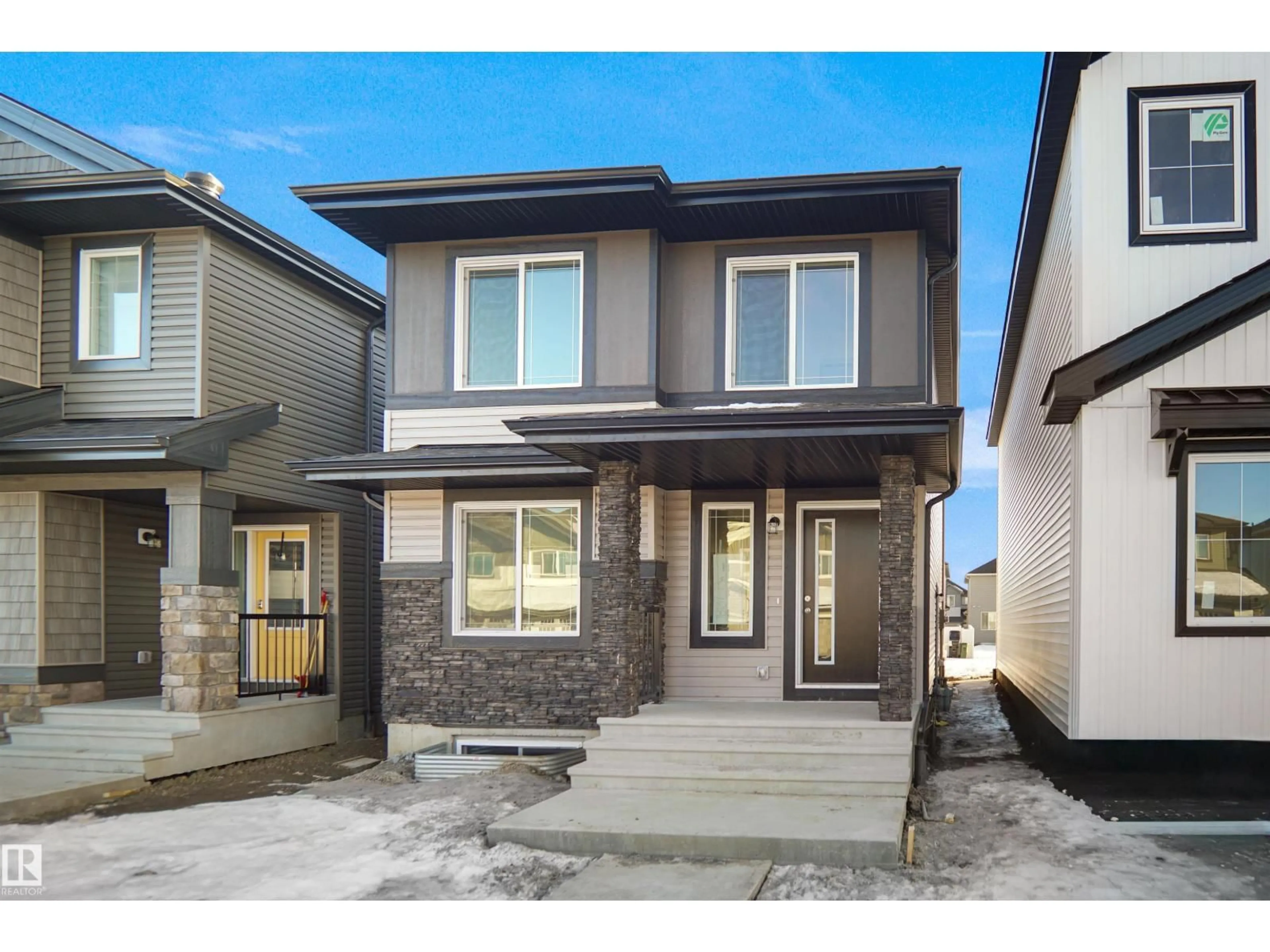 Home with vinyl exterior material, street for 261 FALCON CR, Leduc Alberta T0B3M3