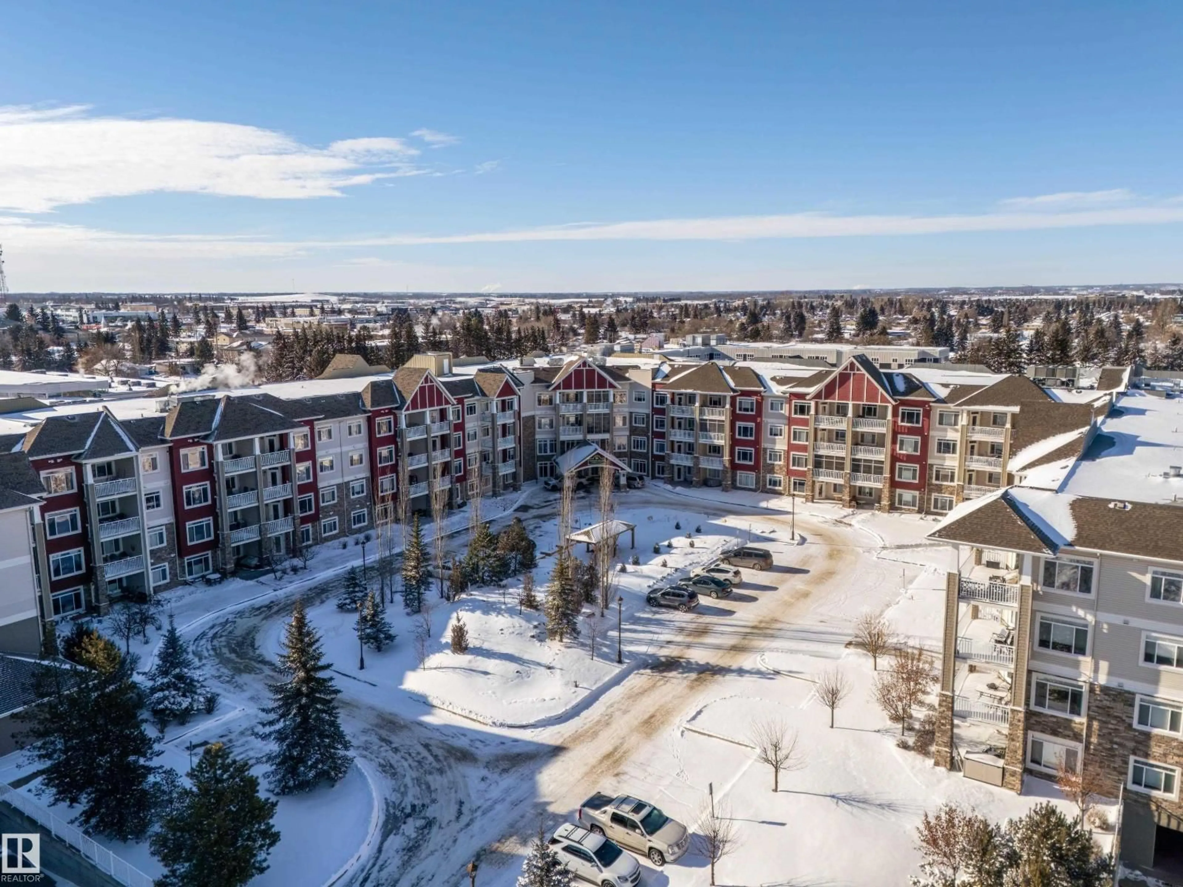 A pic from outside/outdoor area/front of a property/back of a property/a pic from drone, mountain view for 245 511 QUEEN ST, Spruce Grove Alberta T7X0G4