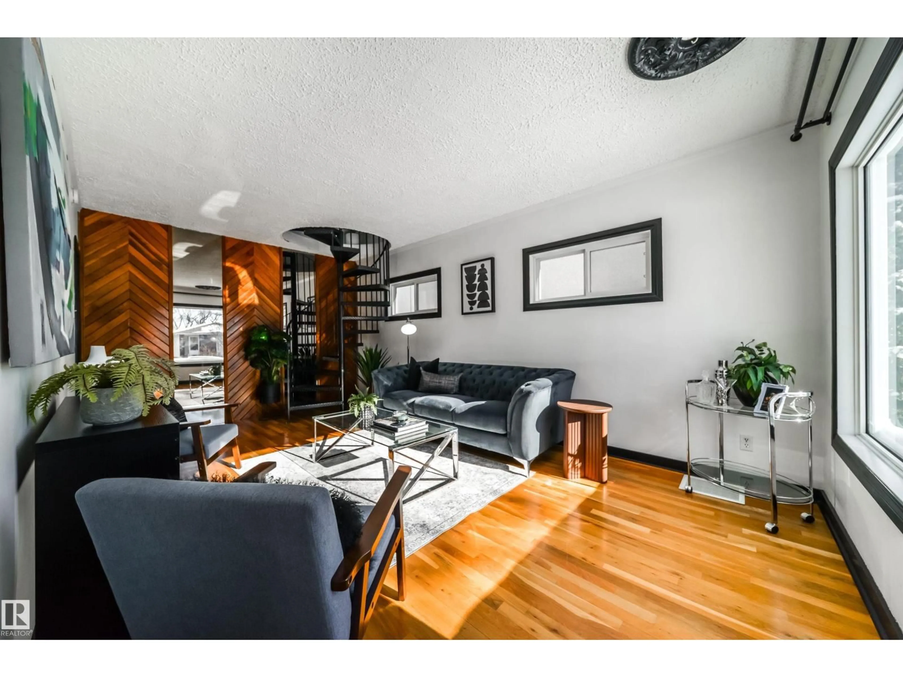 Living room with furniture, wood/laminate floor for NW - 9832 85 AVENUE, Edmonton Alberta T6E2J6