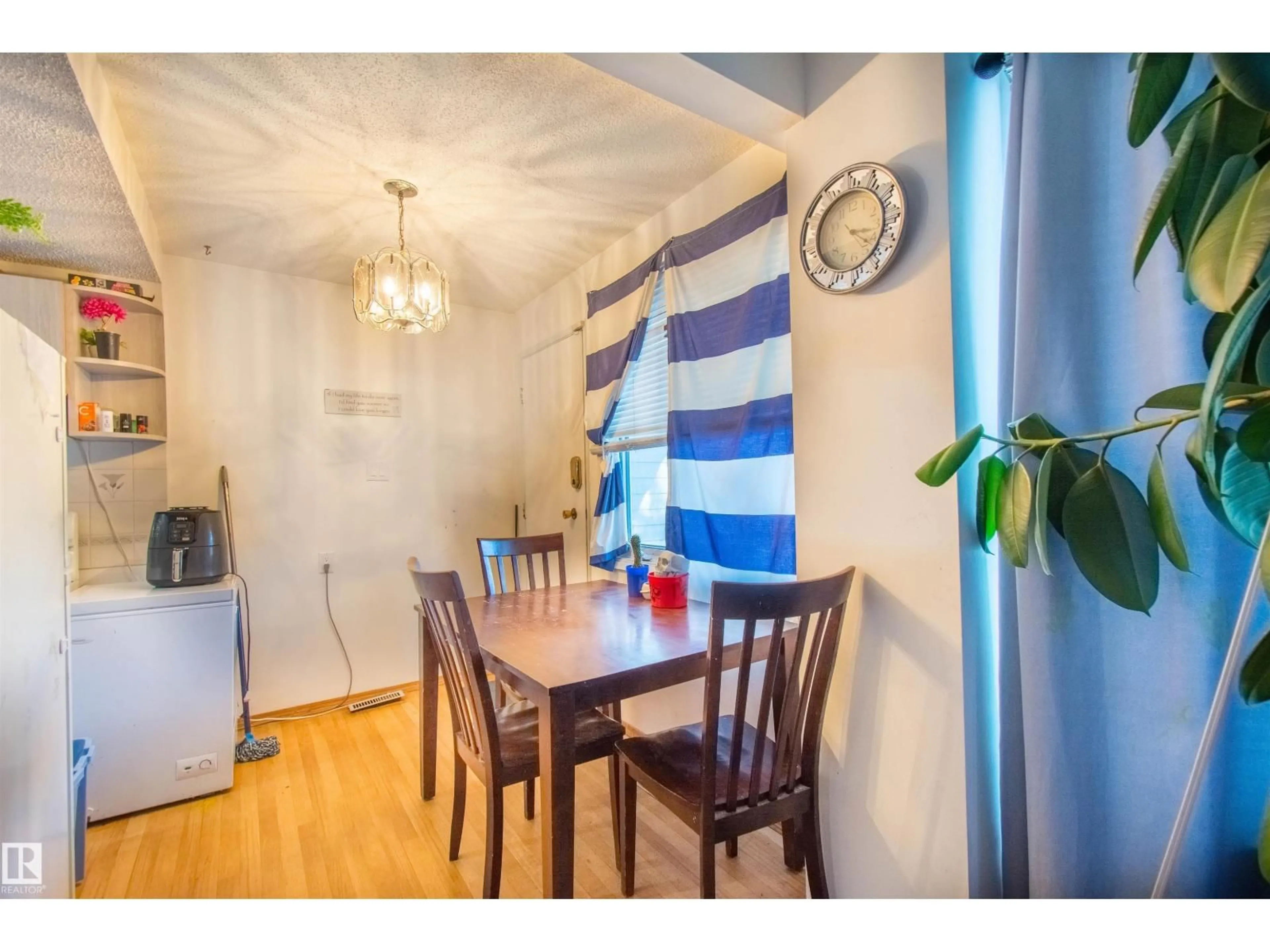 Dining room, wood/laminate floor for NW - 21 AMBERLY CO, Edmonton Alberta T6R3A3
