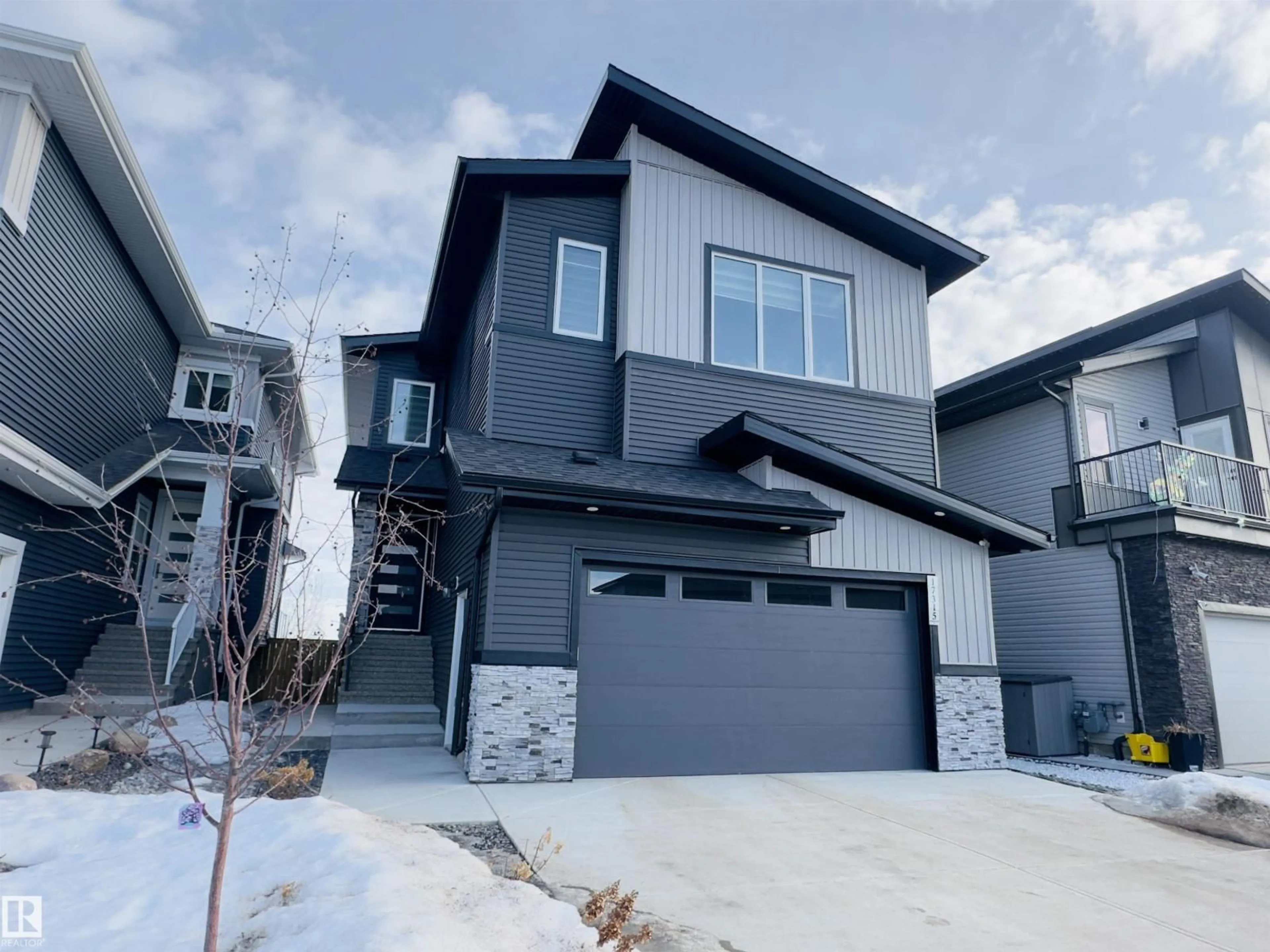 Home with vinyl exterior material, street for NW - 17315 68 ST, Edmonton Alberta T5Z0W4