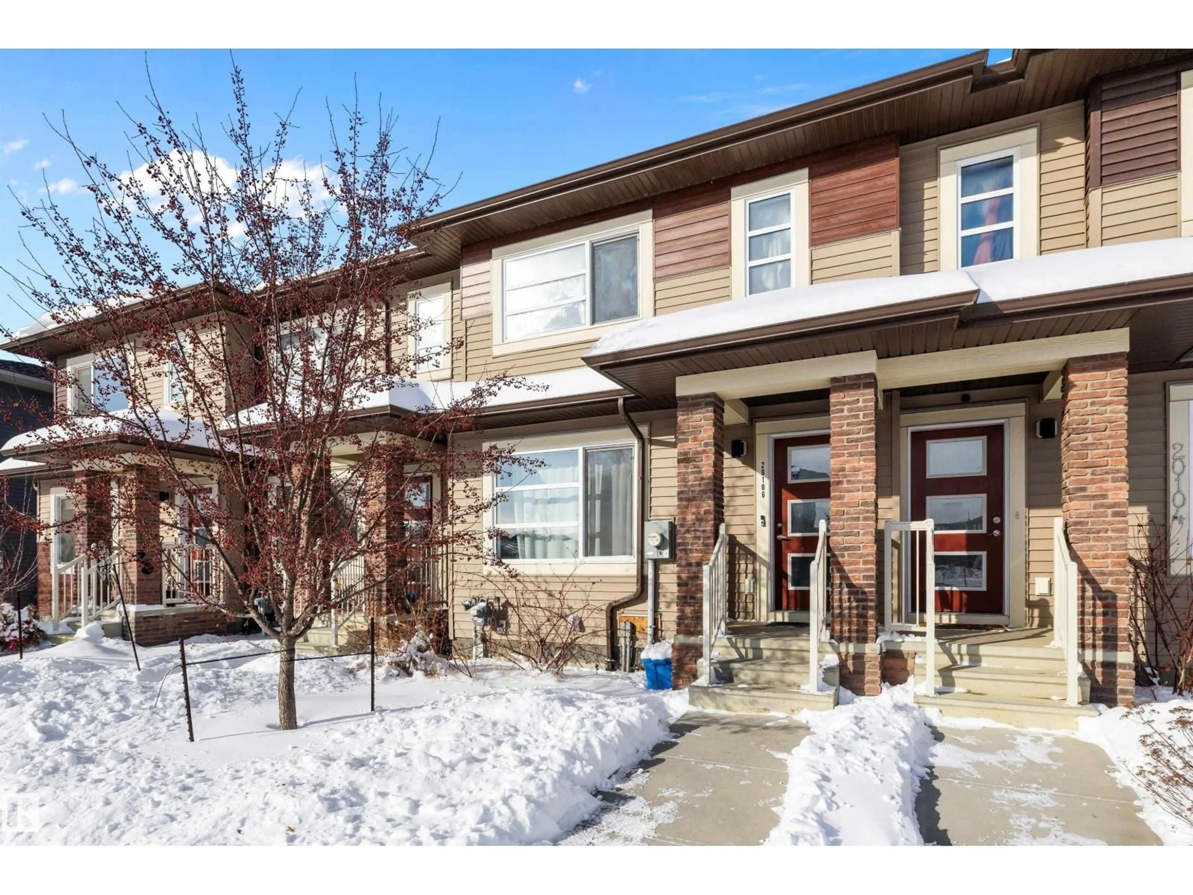 Home with brick exterior material, street for NW - 20106 27 AV, Edmonton Alberta T6M0W7