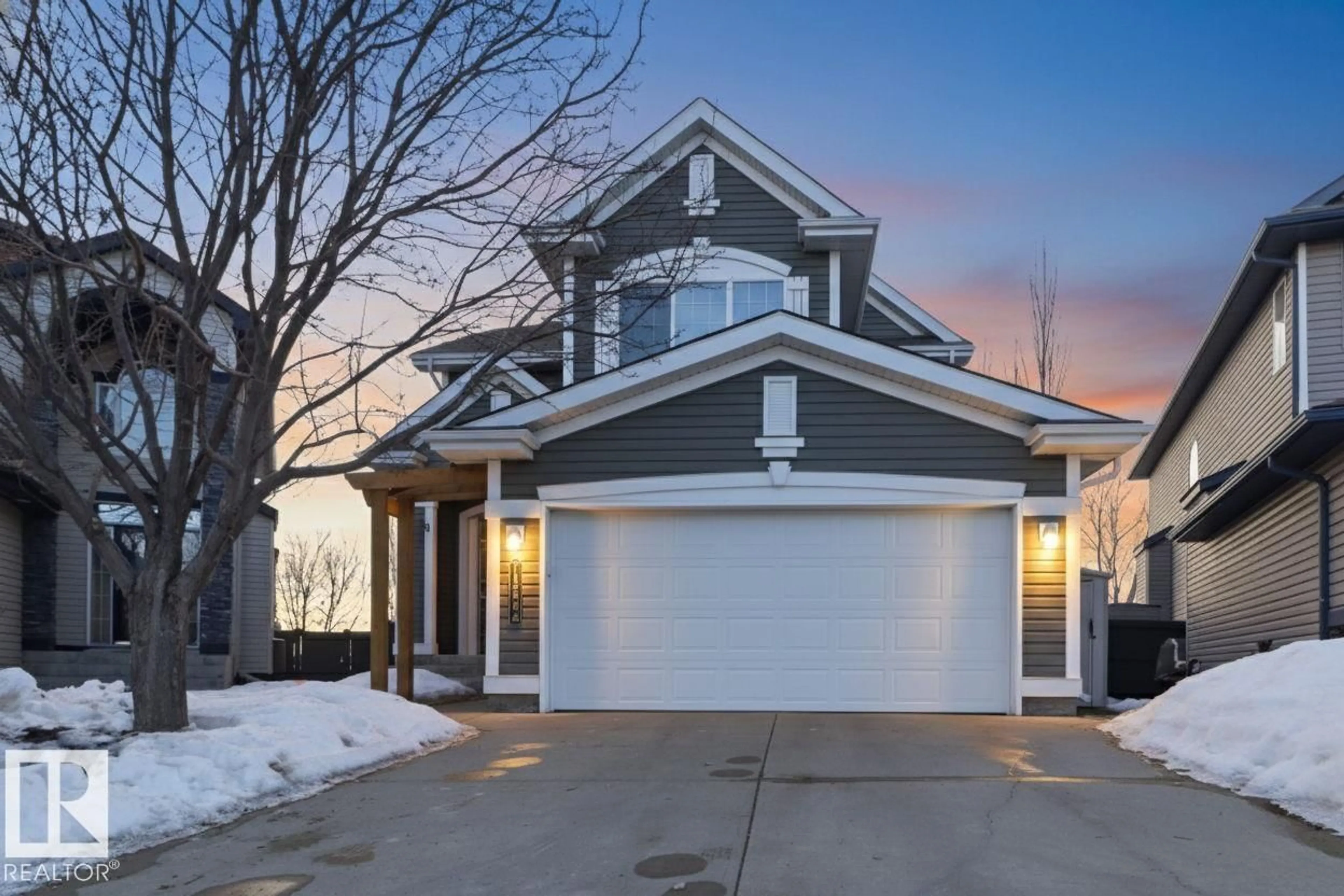 Home with vinyl exterior material, street for 12634 16A AV, Edmonton Alberta T6W1R7