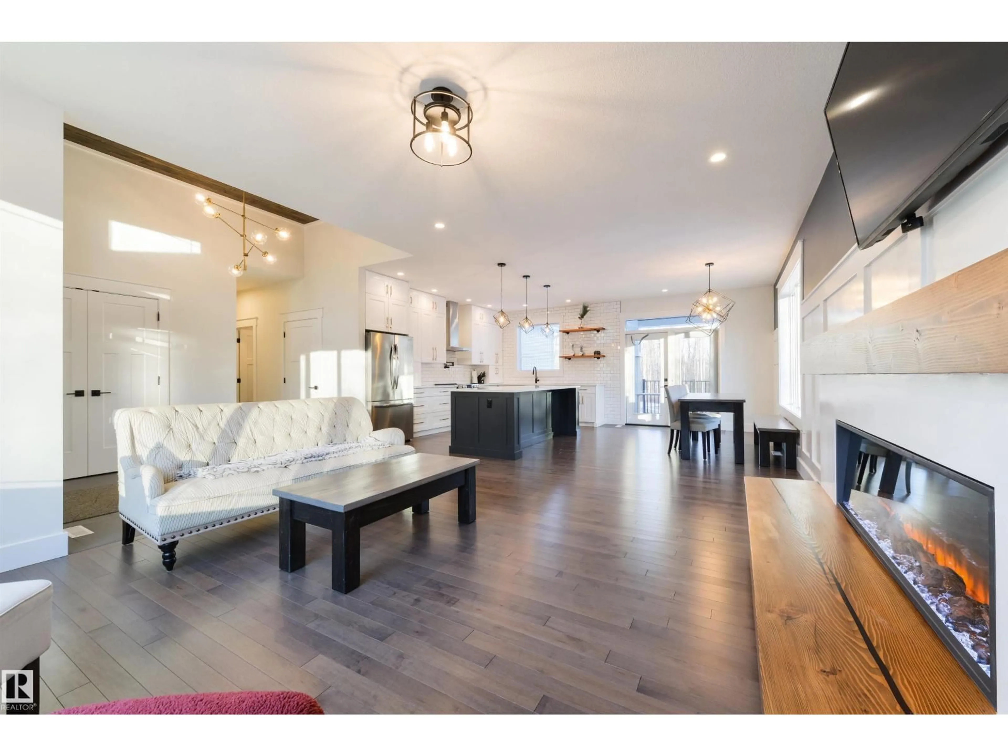 Open concept kitchen, wood/laminate floor for 14 - 2406 TWP ROAD 540, Rural Lac Ste. Anne County Alberta T0E1V0