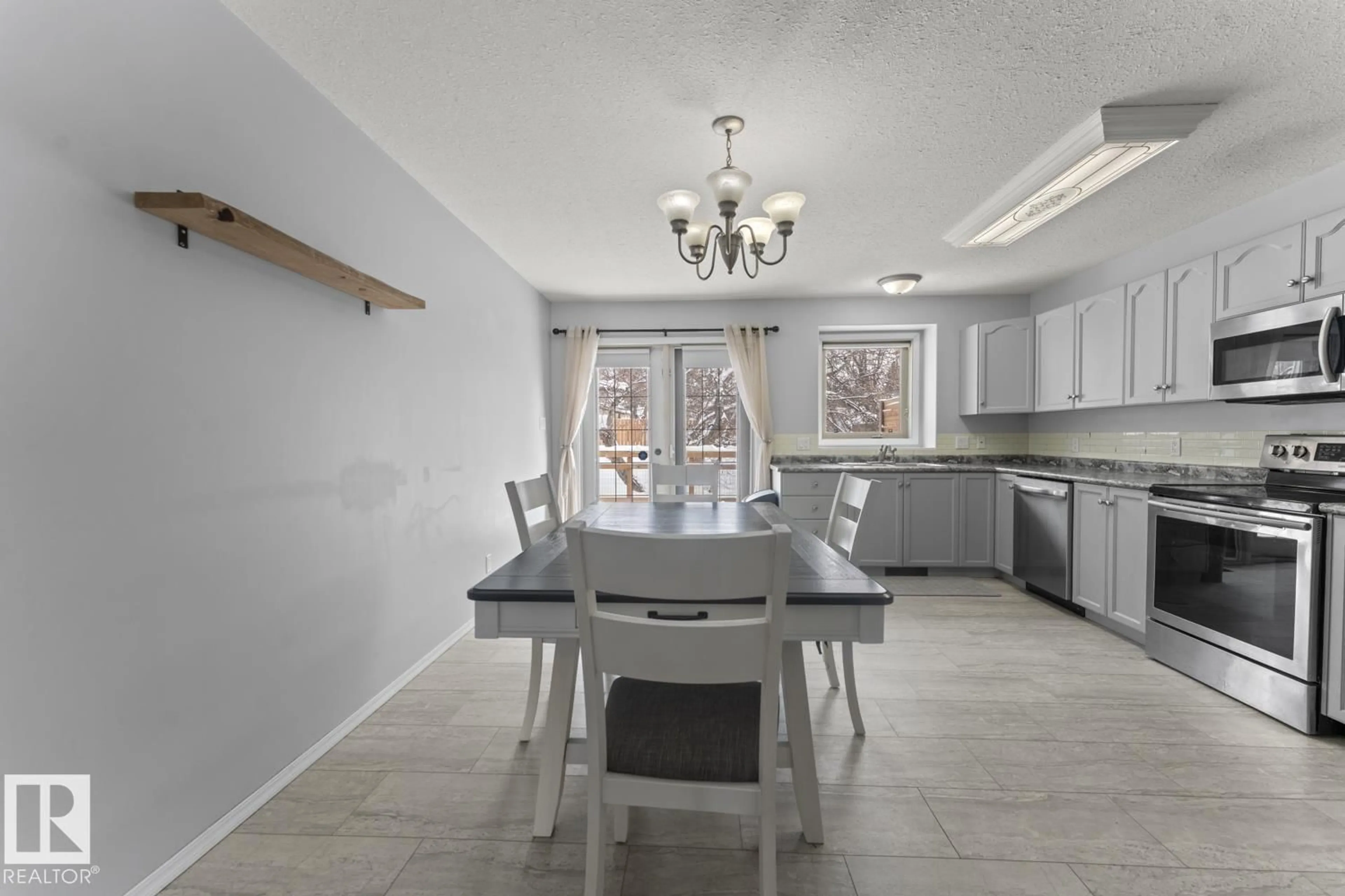 Open concept kitchen, ceramic/tile floor for 1006 11 ST, Cold Lake Alberta T9M1J1