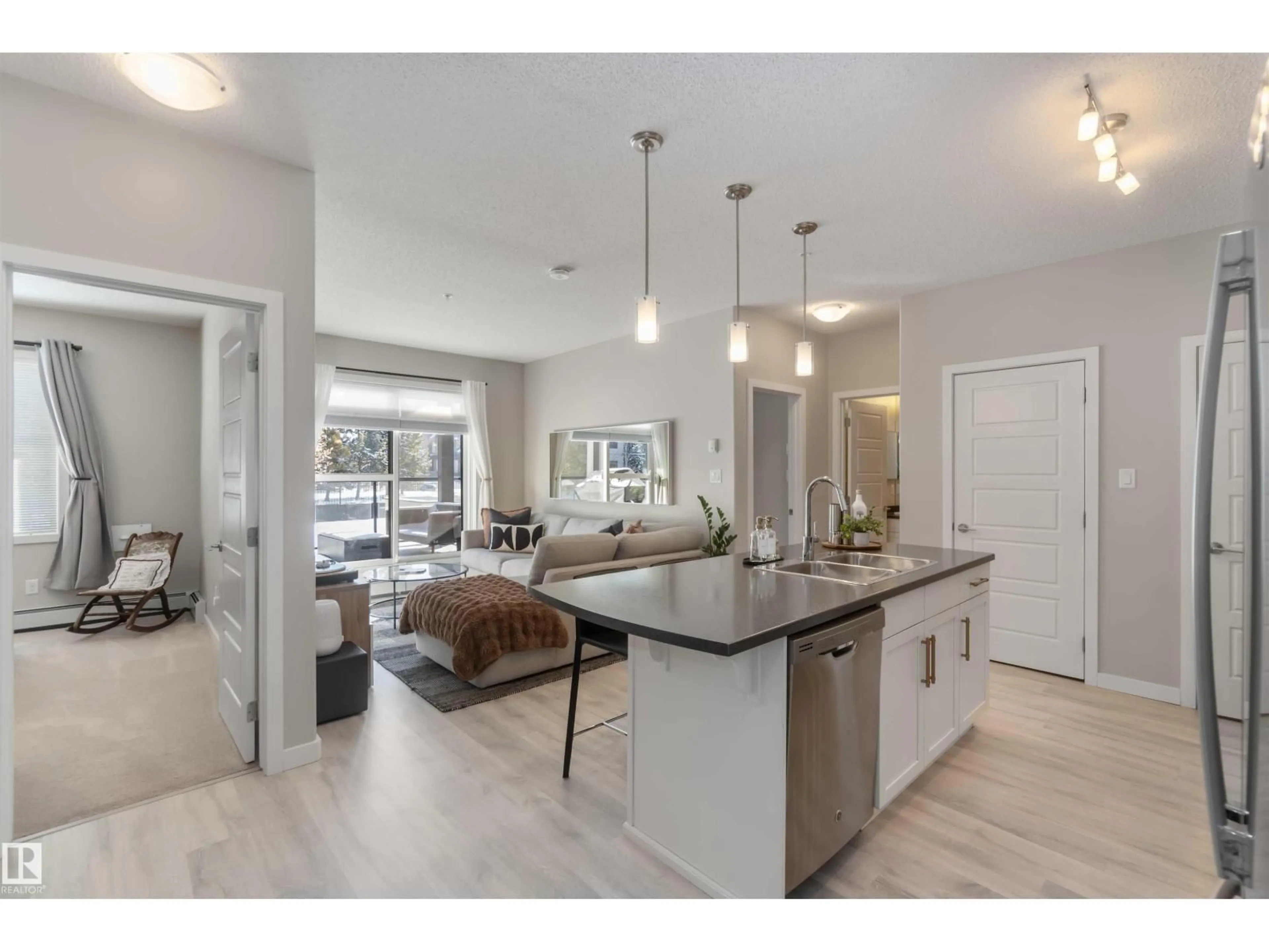 Open concept kitchen, unknown for #103 - 320 AMBLESIDE LINK, Edmonton Alberta T6W2Z9
