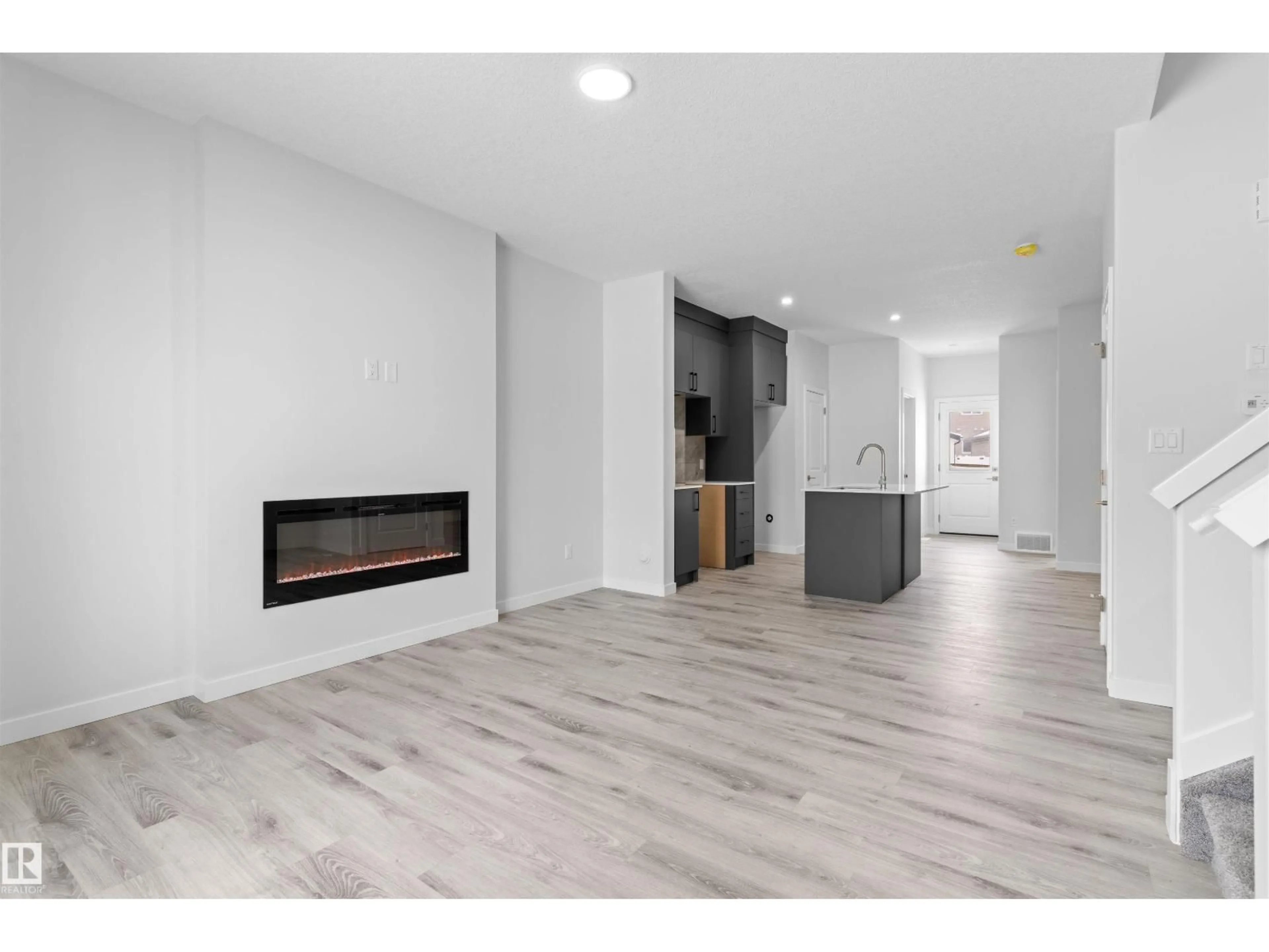 Open concept kitchen, unknown for 320 MUNN WY, Leduc Alberta T9E1V1