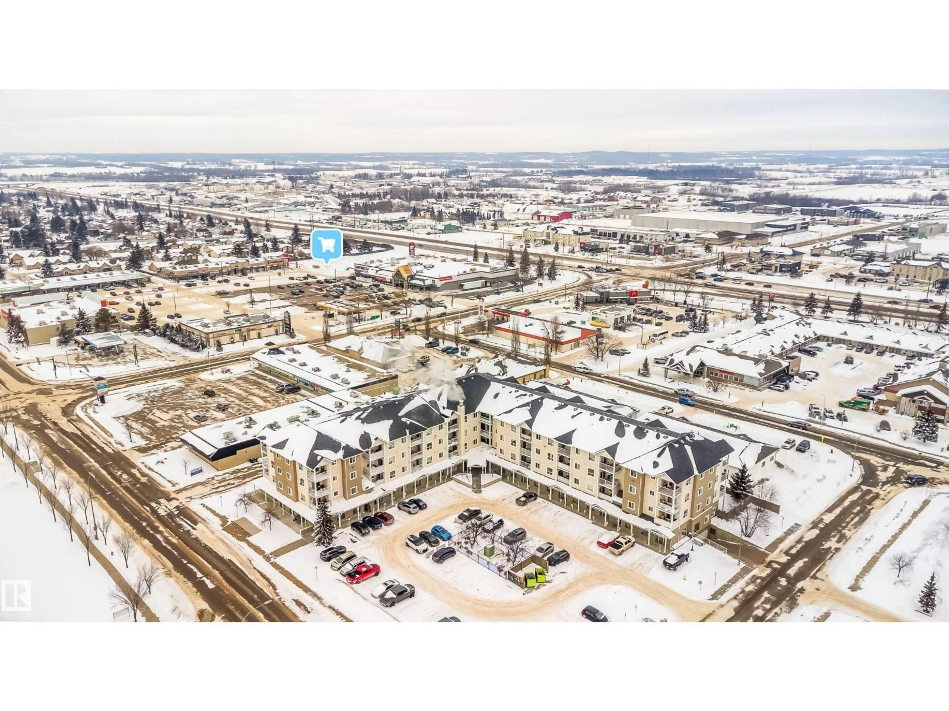 A pic from outside/outdoor area/front of a property/back of a property/a pic from drone, unknown for #211 - 4310 33 ST, Stony Plain Alberta T7Z0A8