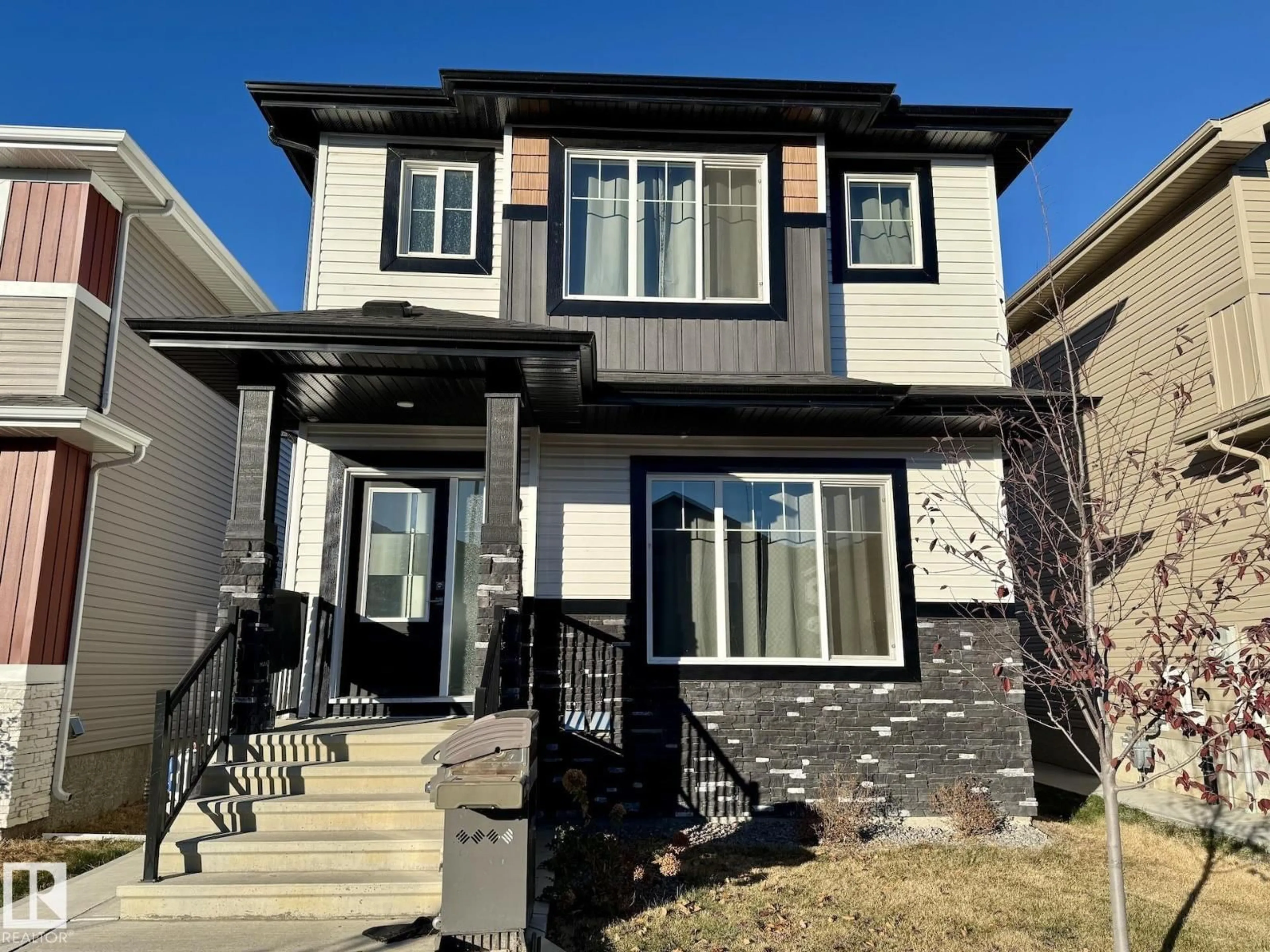 Home with vinyl exterior material, street for 90 WYATT RG, Fort Saskatchewan Alberta T8L0Y3