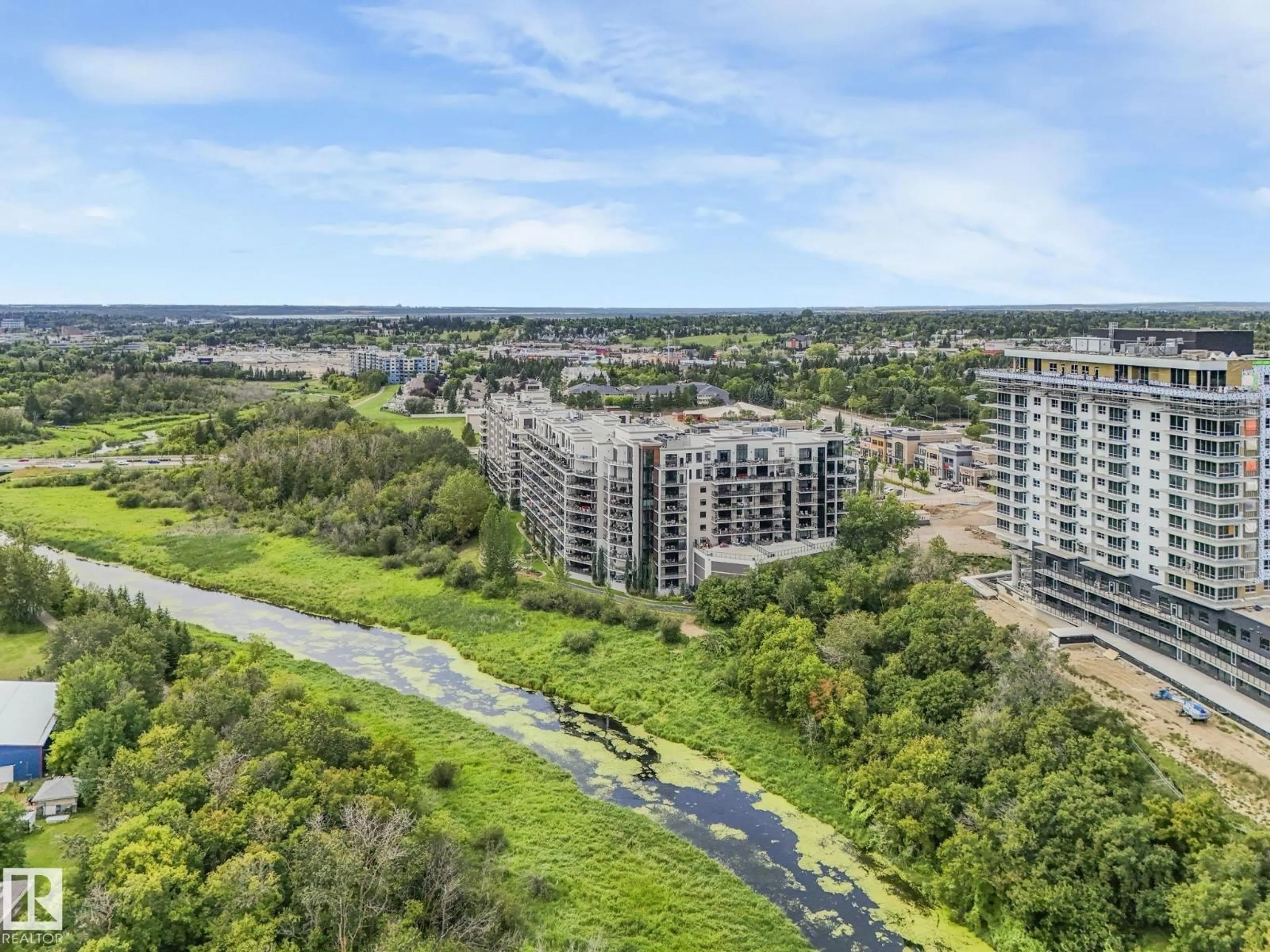 A pic from outside/outdoor area/front of a property/back of a property/a pic from drone, water/lake/river/ocean view for 814 BELLEROSE DR, St. Albert Alberta T8N7P7
