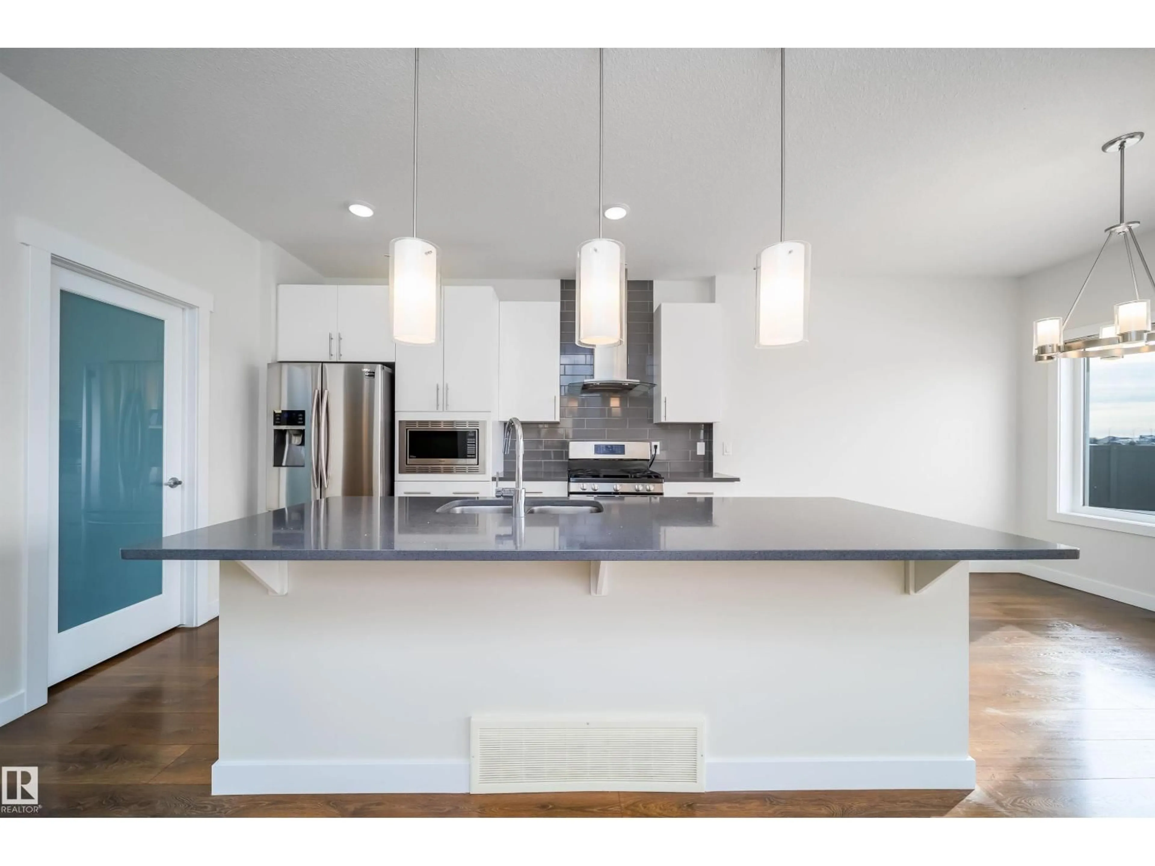 Contemporary kitchen, wood/laminate floor for 19743 26 AV, Edmonton Alberta T6M0X5