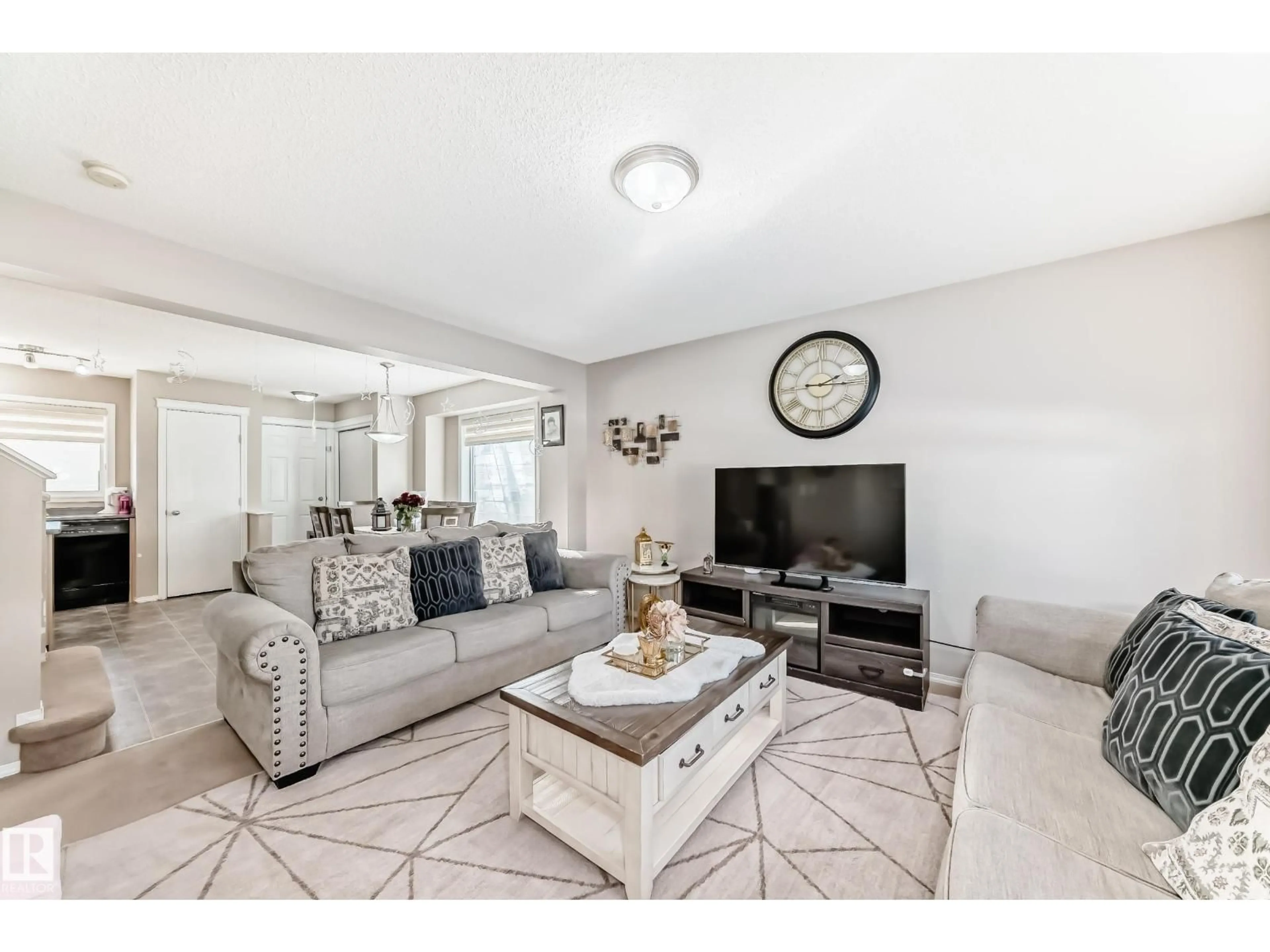 Living room with furniture, unknown for 14043 151 AV, Edmonton Alberta T6V1T6