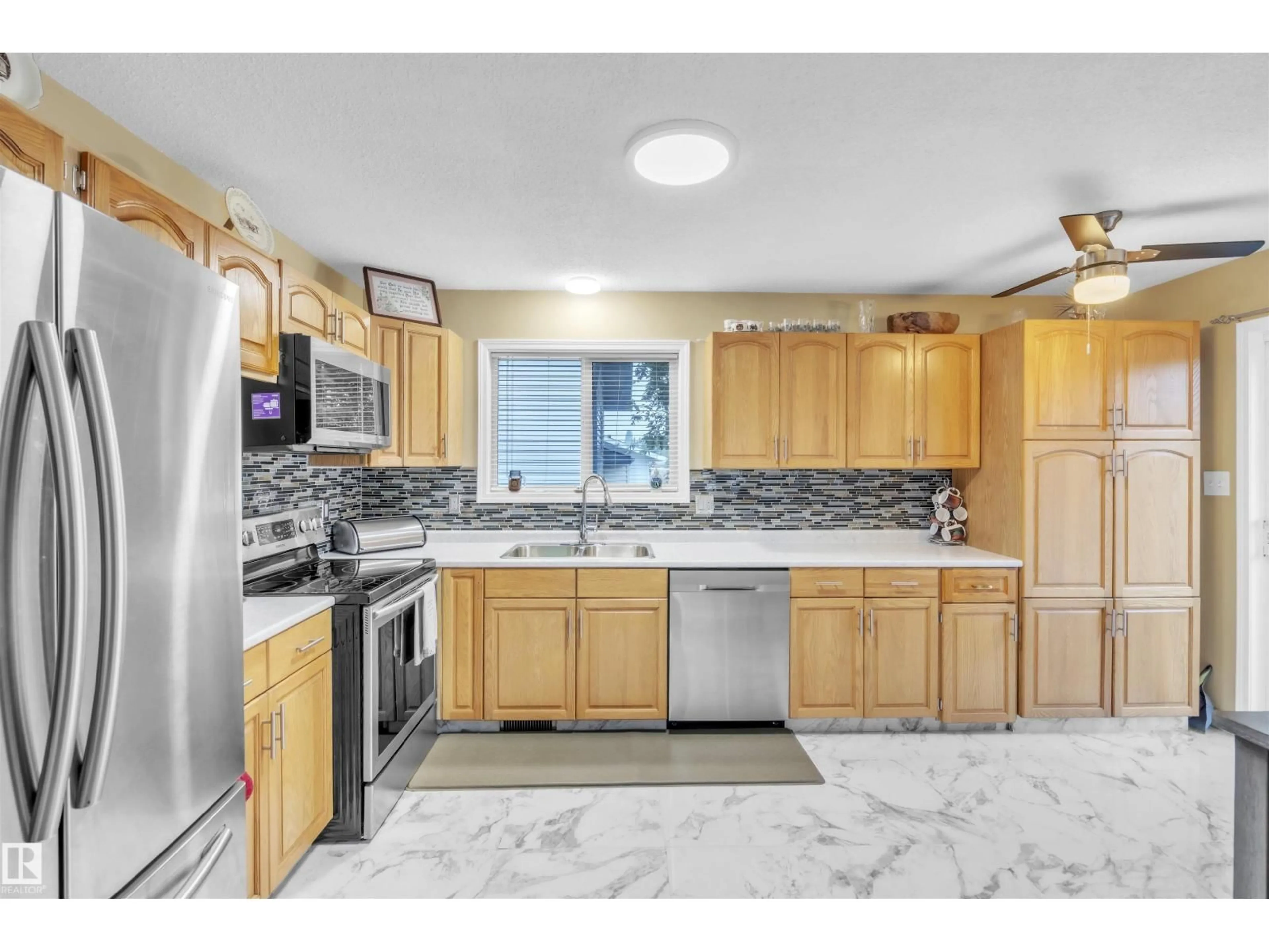 Open concept kitchen, ceramic/tile floor for 4502 49 AV, Cold Lake Alberta T9M1Z6