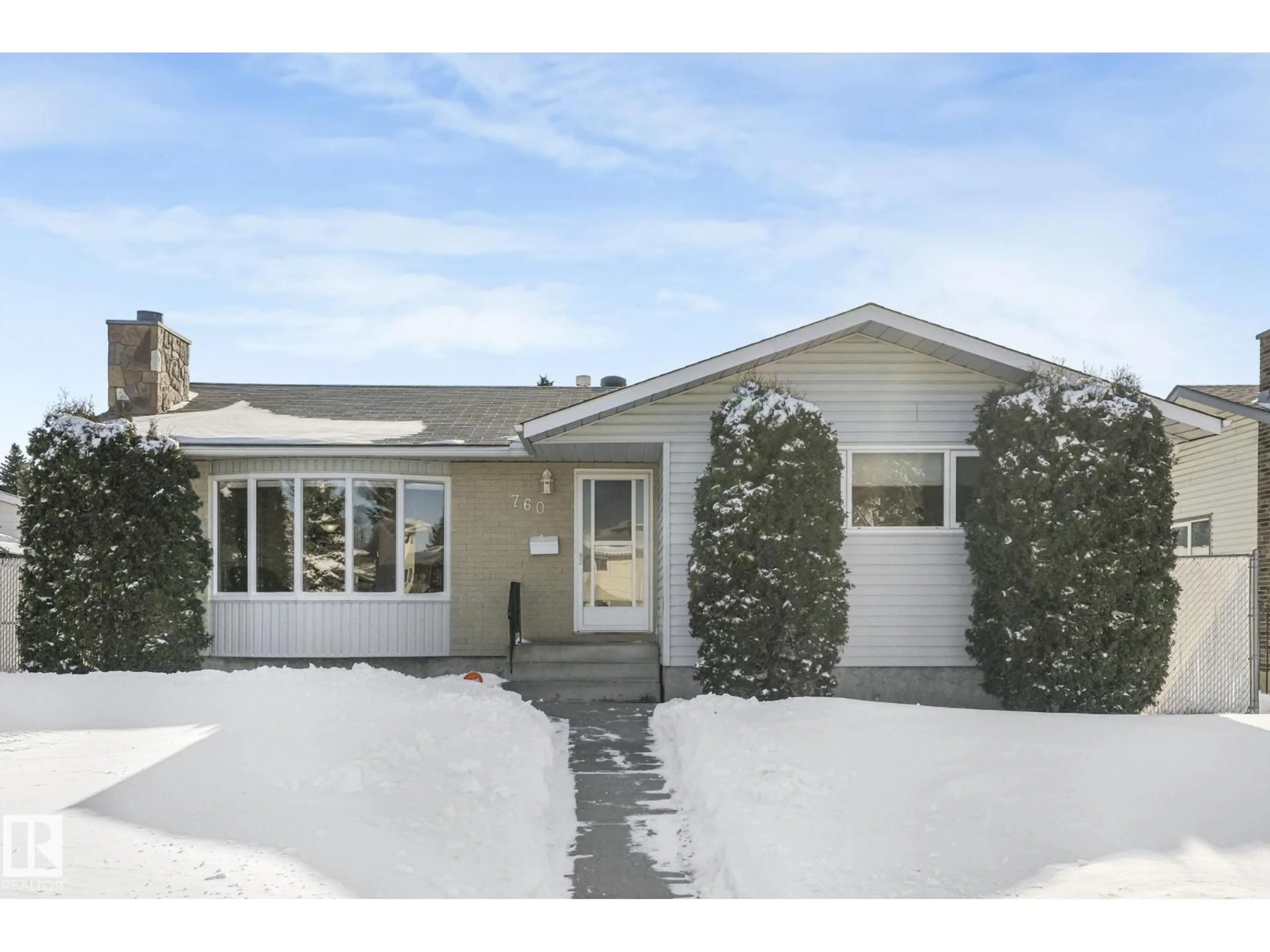 Home with vinyl exterior material, street for NW - 760 KNOTTWOOD RD S, Edmonton Alberta T6K1W5