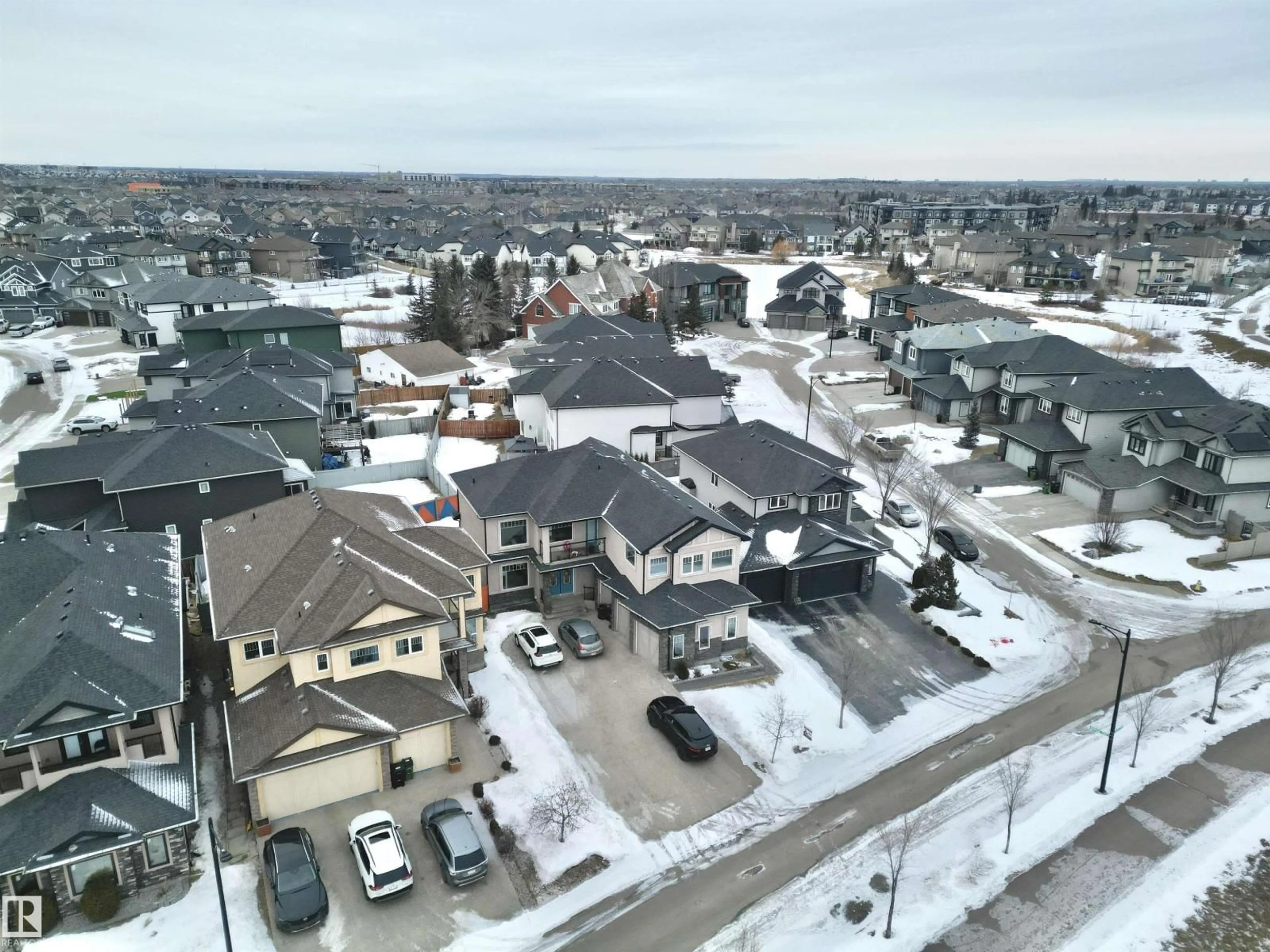 A pic from outside/outdoor area/front of a property/back of a property/a pic from drone, street for 1273 ADAMSON DR, Edmonton Alberta T6W1Z4