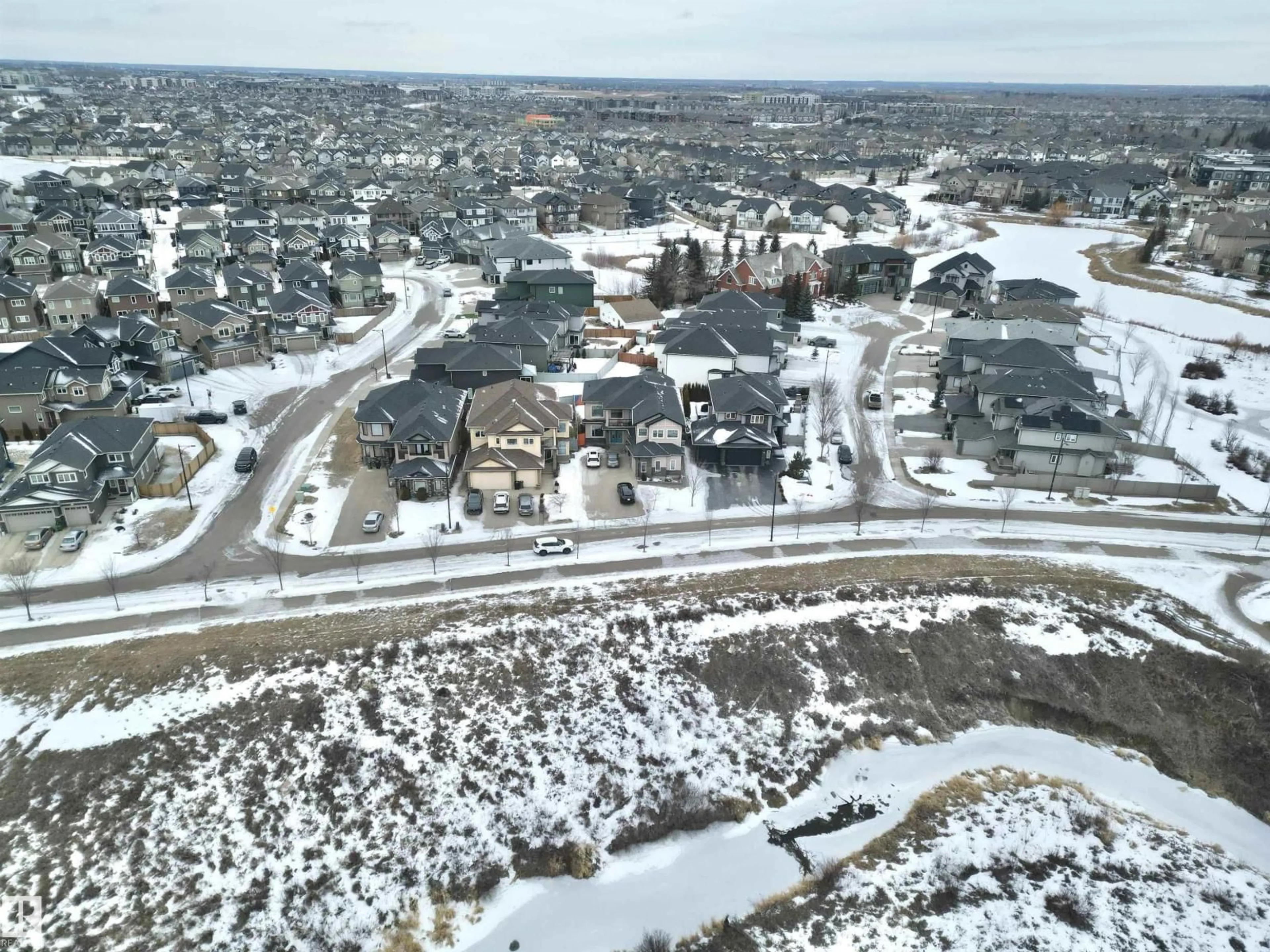 A pic from outside/outdoor area/front of a property/back of a property/a pic from drone, street for 1273 ADAMSON DR, Edmonton Alberta T6W1Z4