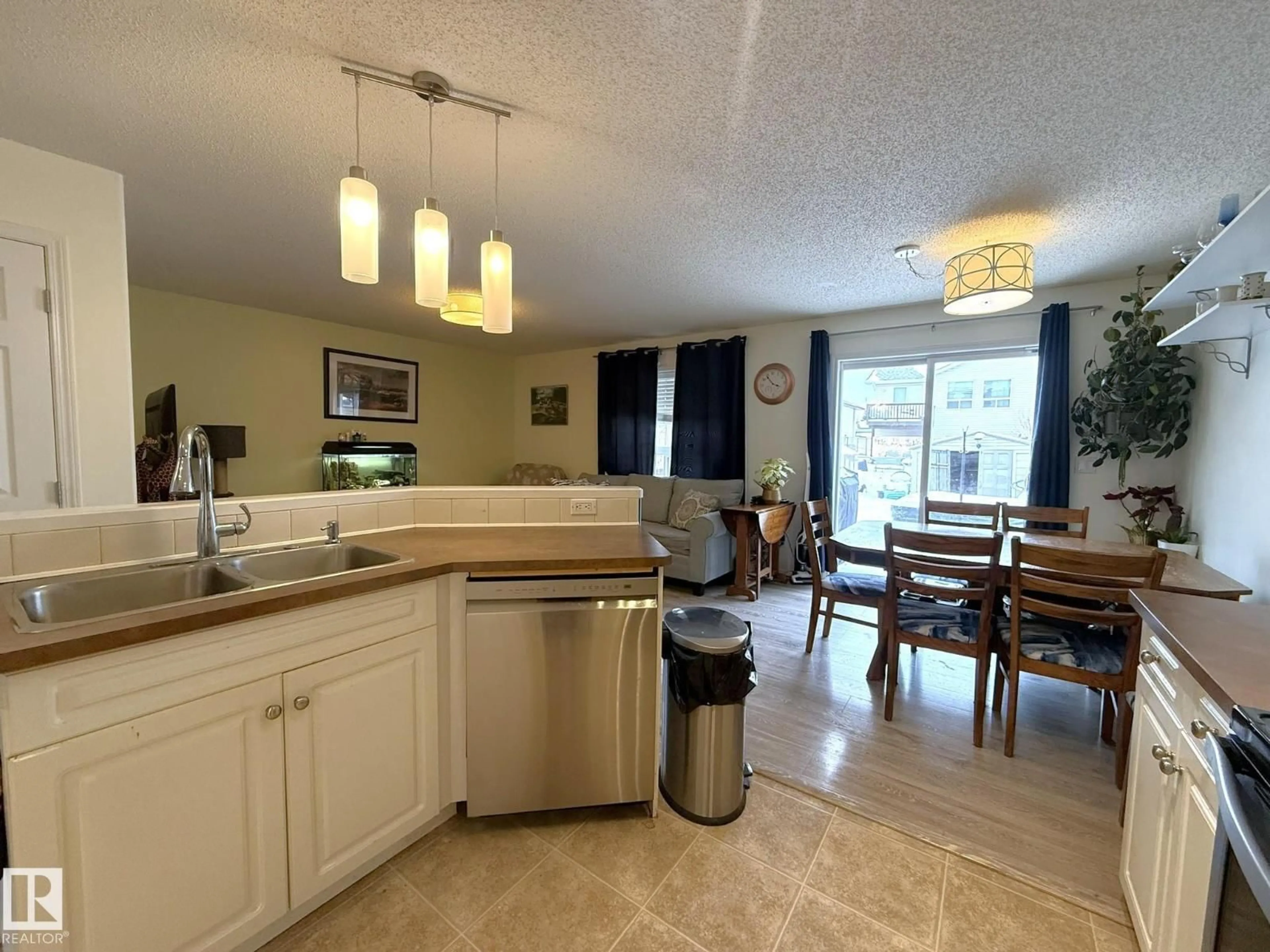 Open concept kitchen, ceramic/tile floor for 735 KANANASKIS DR, Devon Alberta T9G2G7