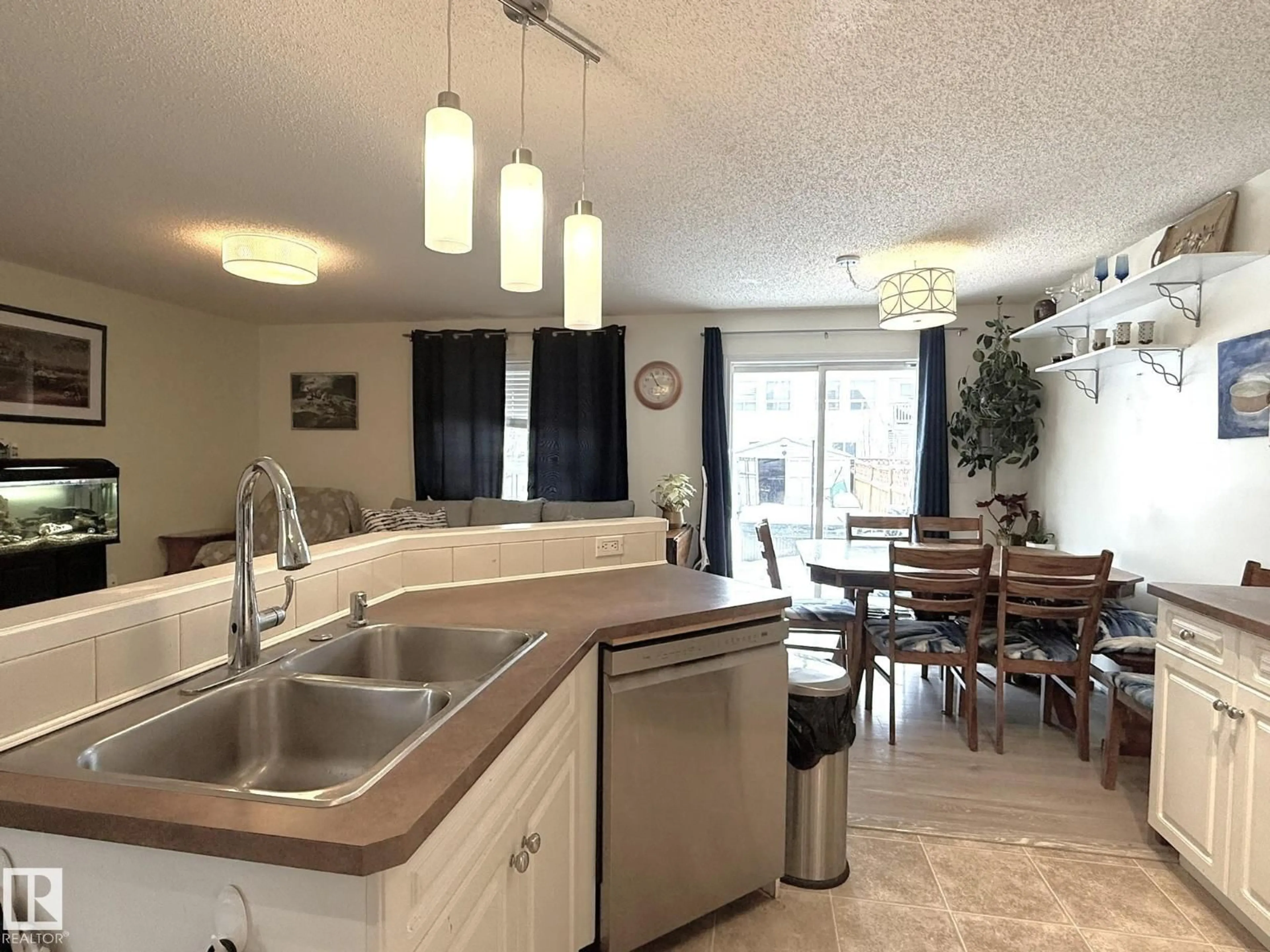 Open concept kitchen, ceramic/tile floor for 735 KANANASKIS DR, Devon Alberta T9G2G7