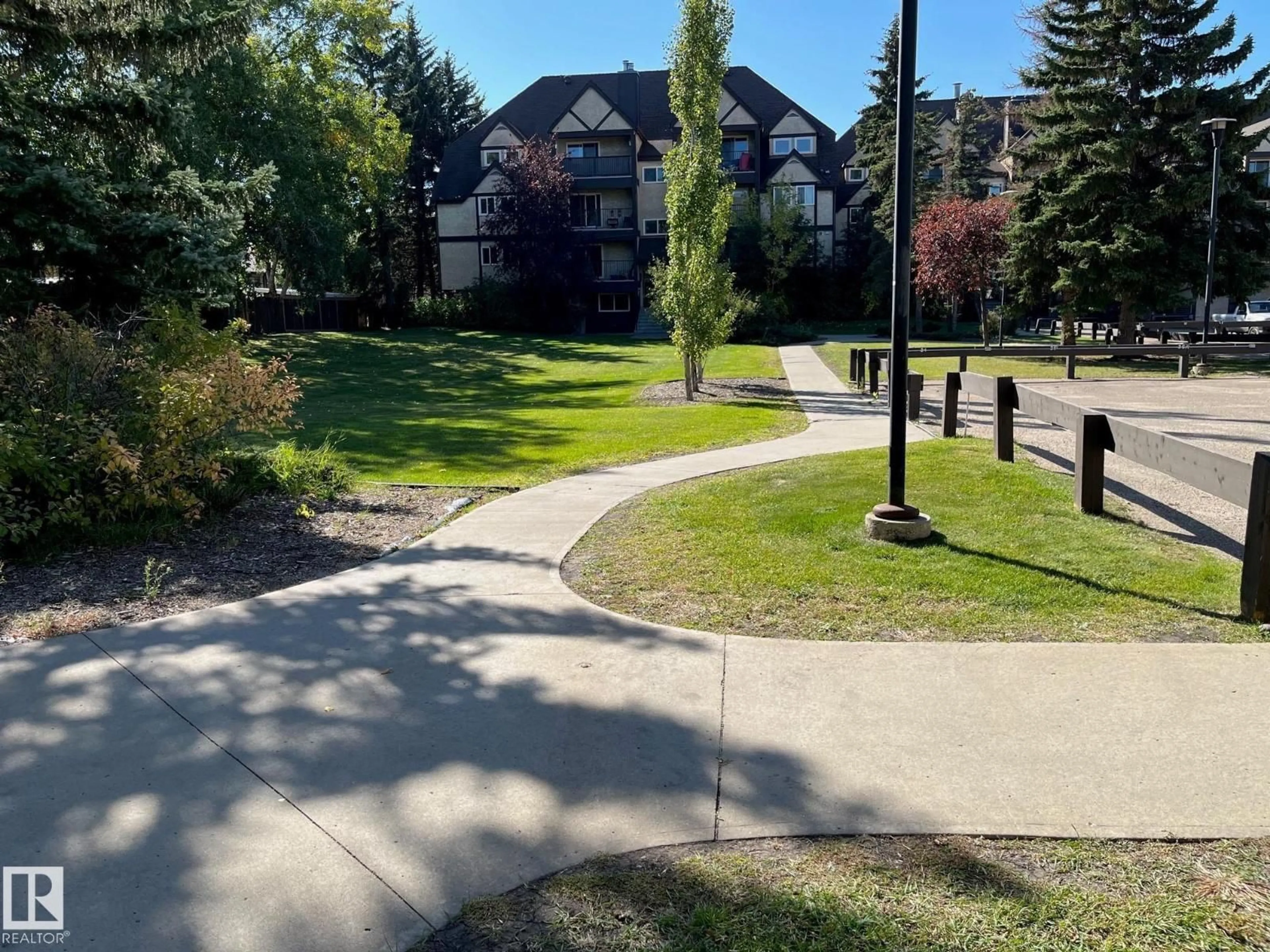 A pic from outside/outdoor area/front of a property/back of a property/a pic from drone, mountain view for 8043 TUDOR GLEN, St. Albert Alberta T8N3V3