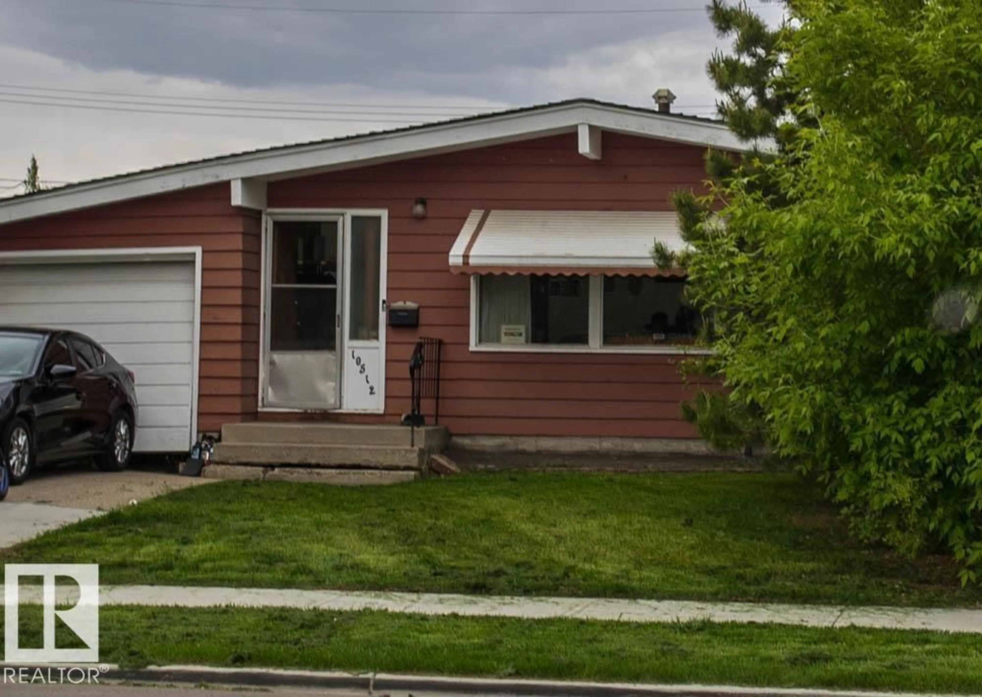 Home with vinyl exterior material, street for 10512 55 AV, Edmonton Alberta T6H0W7