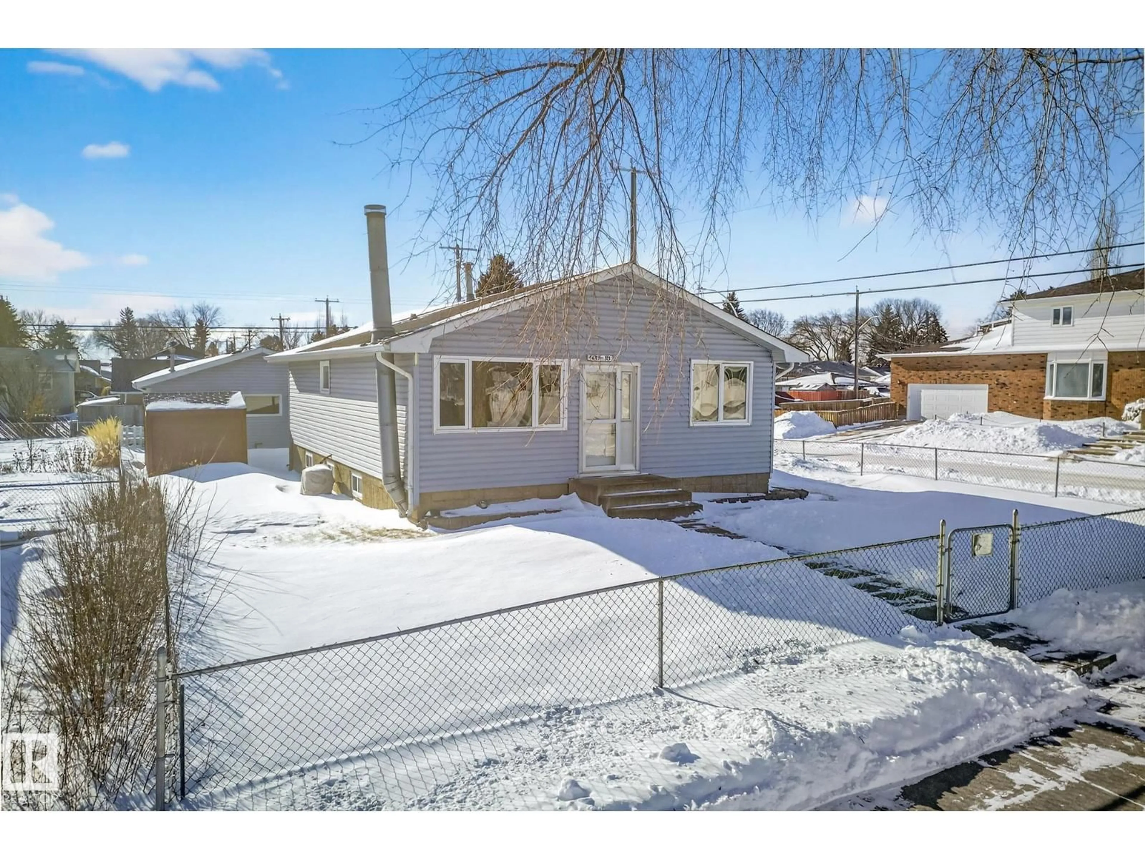 A pic from outside/outdoor area/front of a property/back of a property/a pic from drone, street for 4645 115 AV, Edmonton Alberta T5W0W1