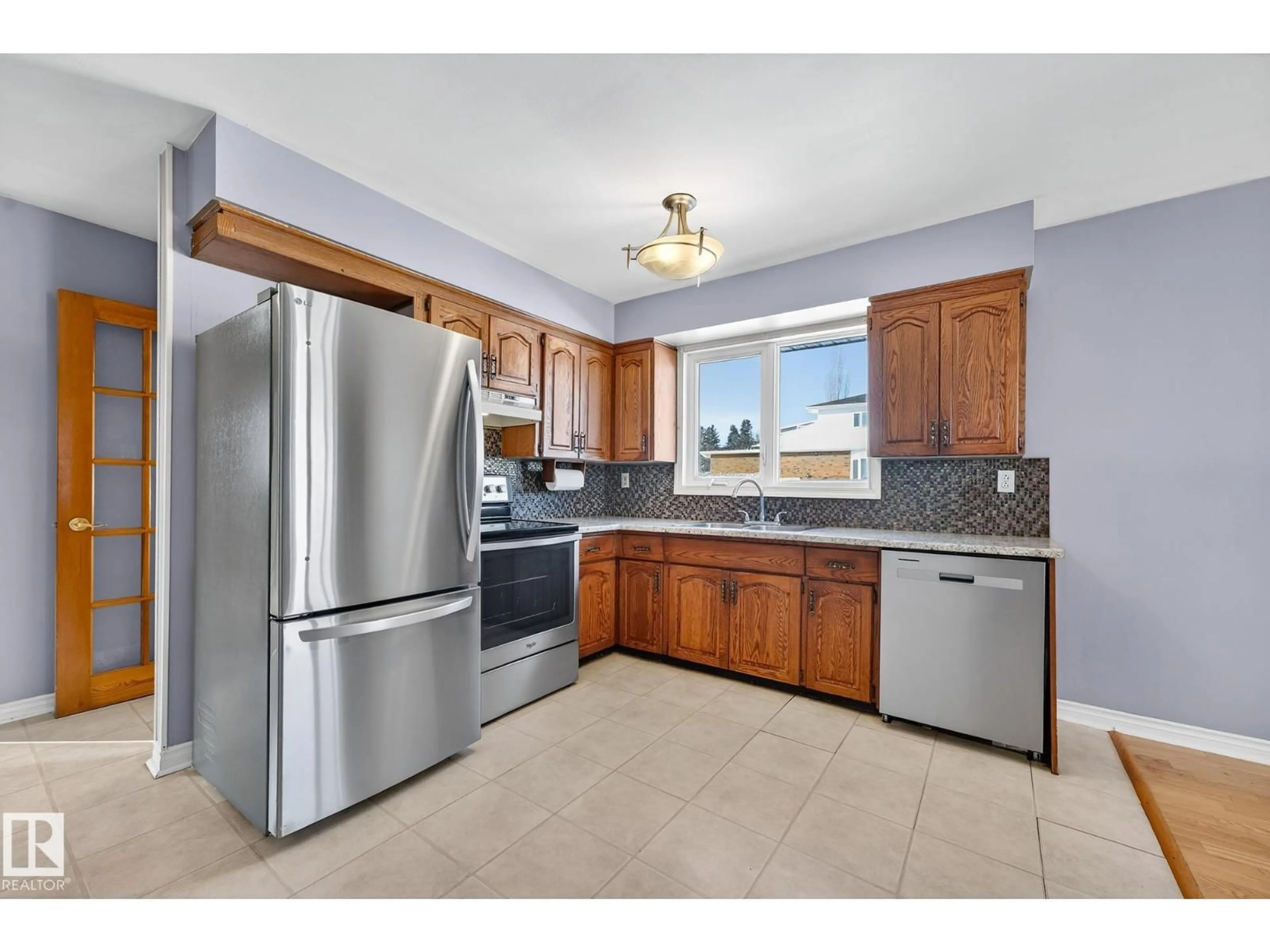 Standard kitchen, ceramic/tile floor for 4645 115 AV, Edmonton Alberta T5W0W1