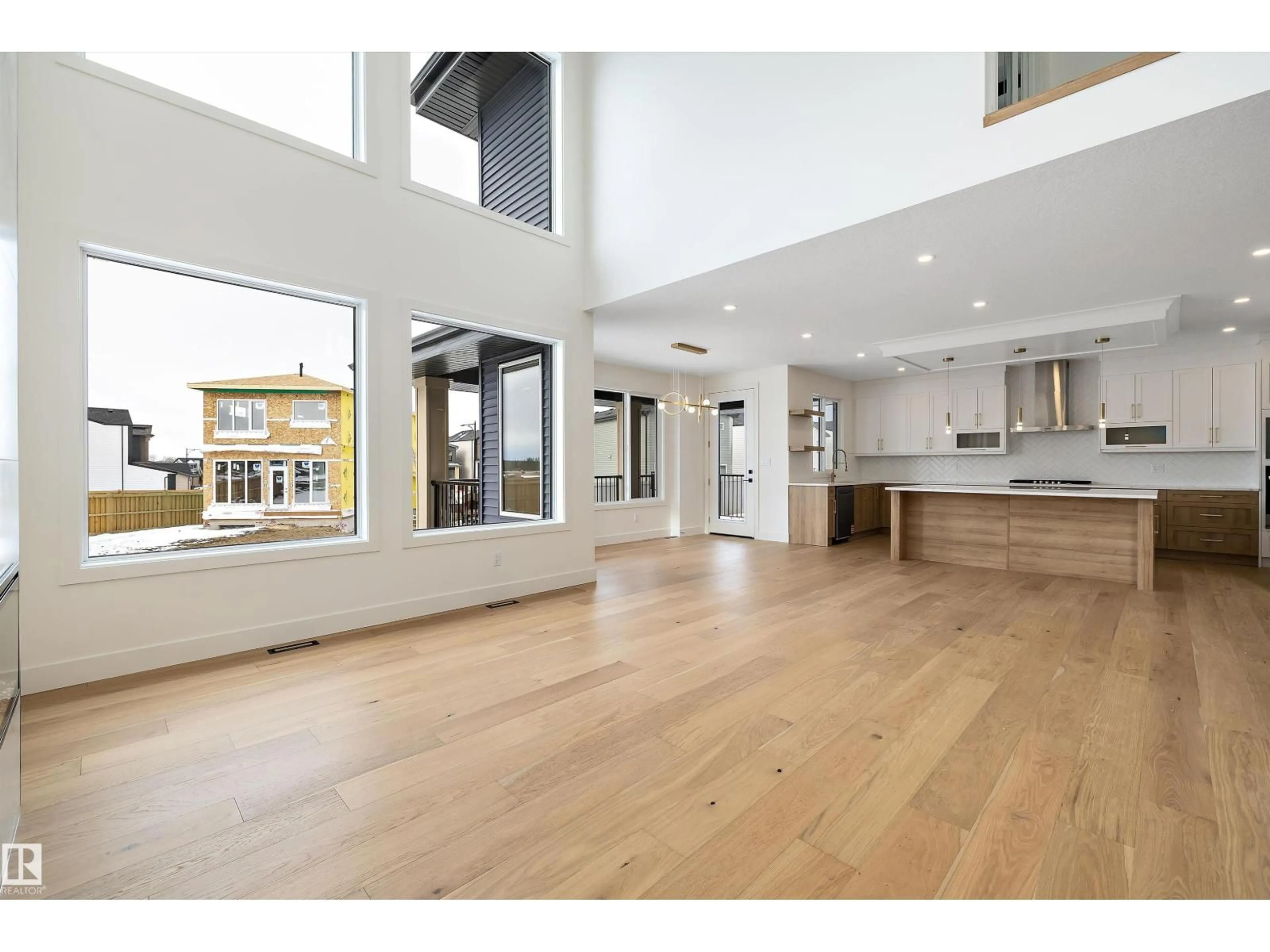 Open concept kitchen, wood/laminate floor for 6871 KNOX LO SW, Edmonton Alberta T6W4R4