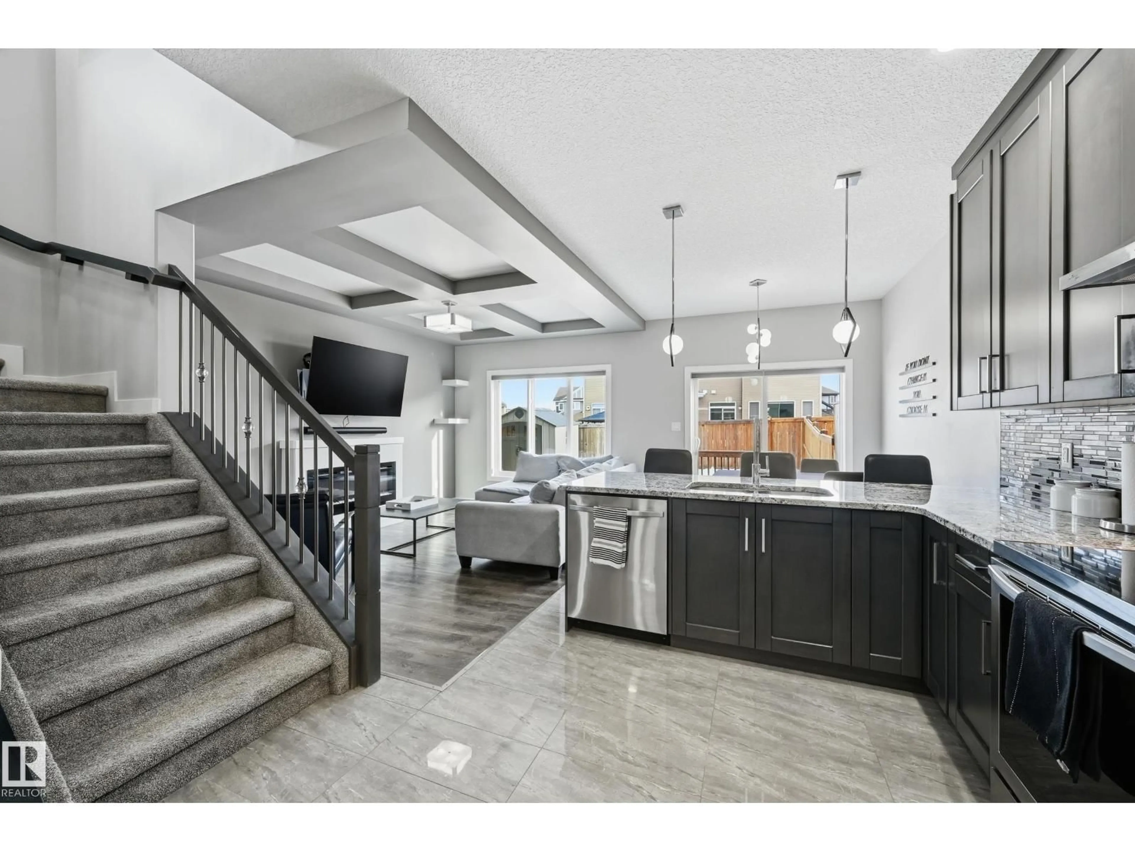 Open concept kitchen, ceramic/tile floor for NW - 16813 65 ST, Edmonton Alberta T5Y3X9