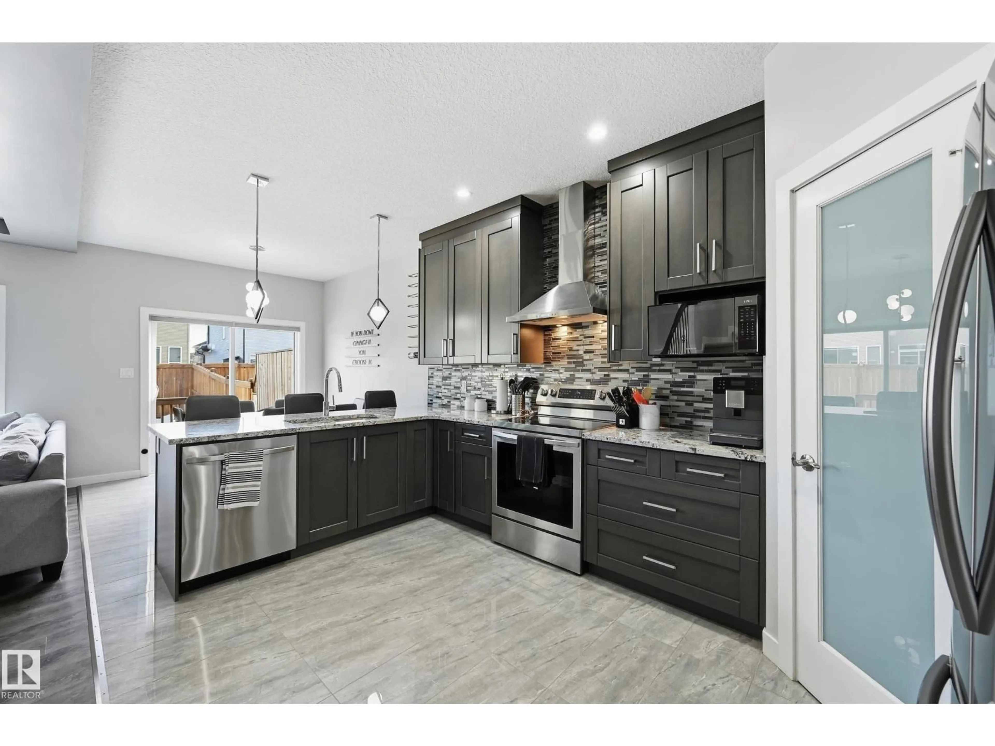 Contemporary kitchen, ceramic/tile floor for NW - 16813 65 ST, Edmonton Alberta T5Y3X9