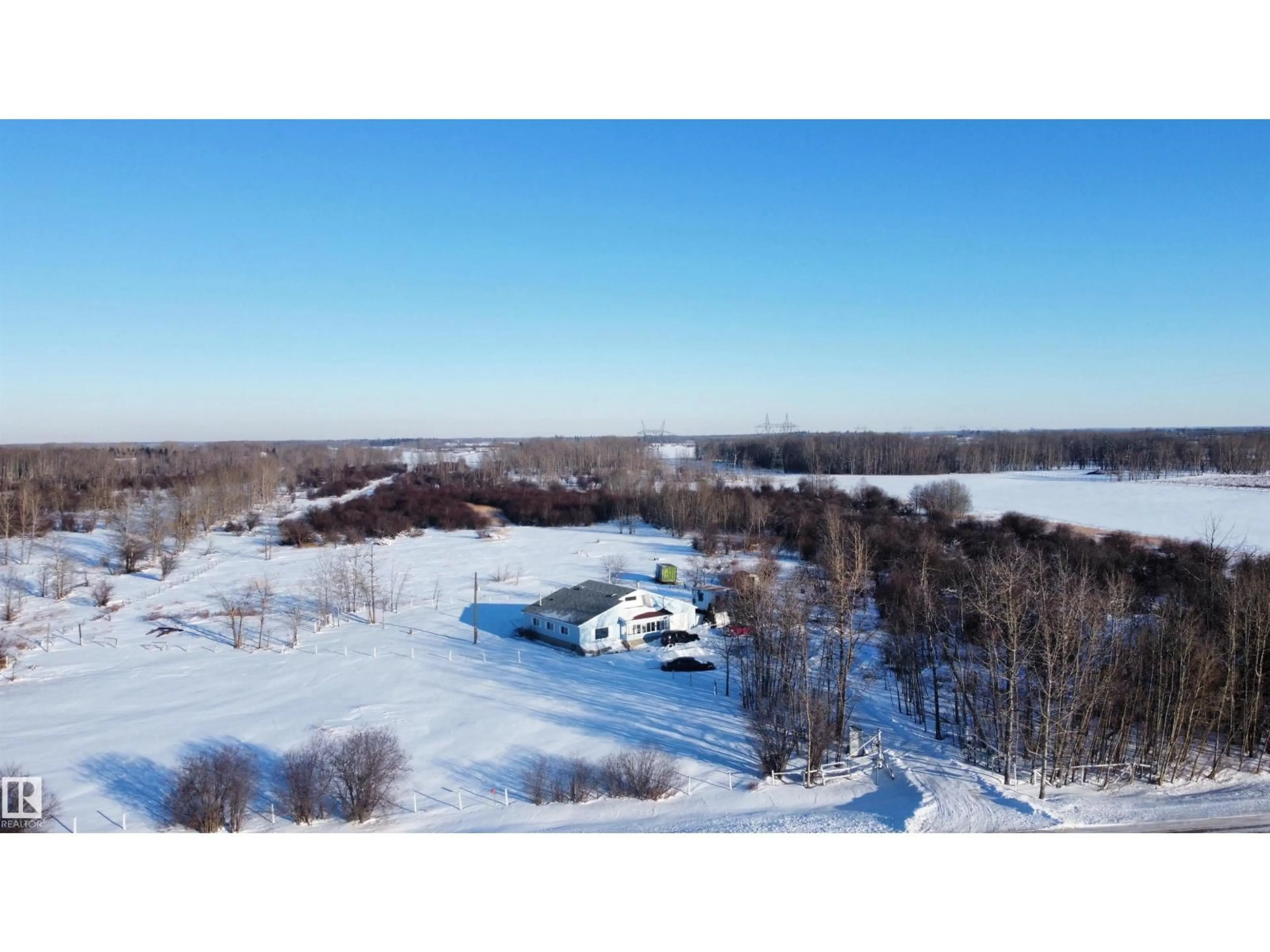 A pic from outside/outdoor area/front of a property/back of a property/a pic from drone, water/lake/river/ocean view for 51019 RGE ROAD 273, Rural Parkland County Alberta T7Z1Z7