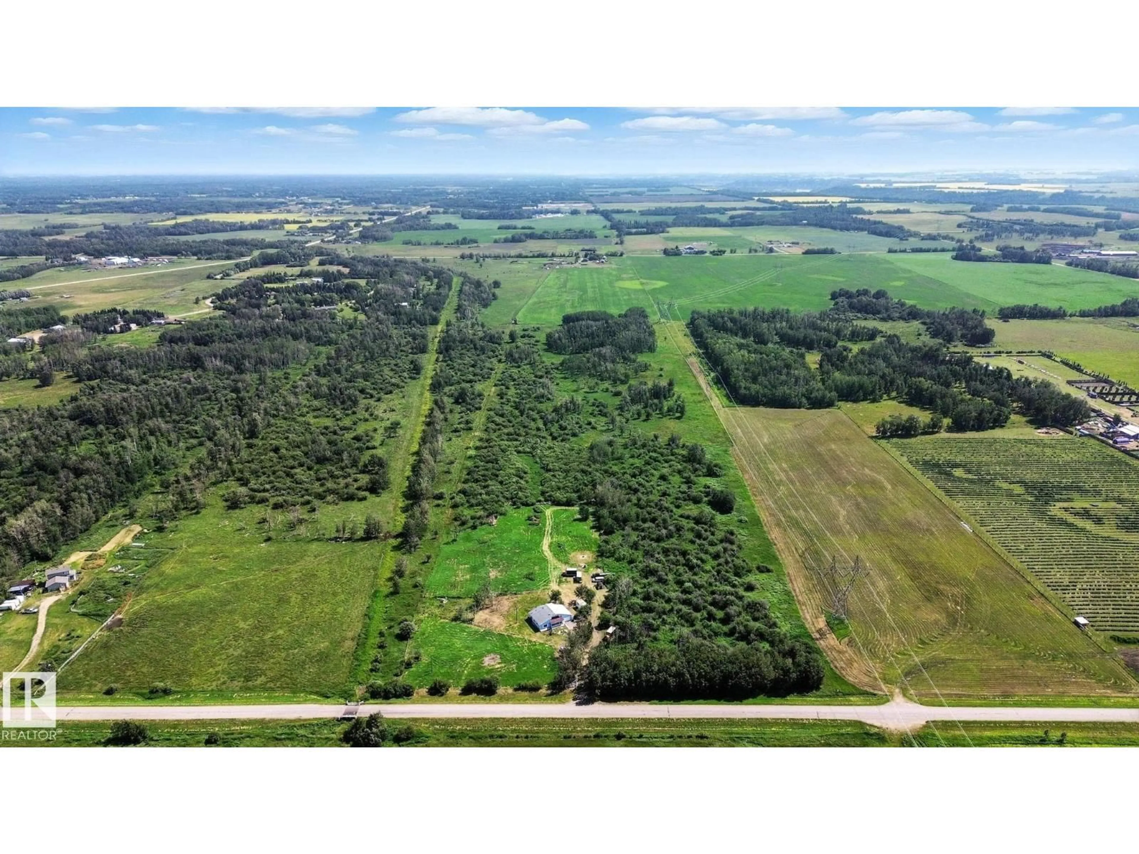 A pic from outside/outdoor area/front of a property/back of a property/a pic from drone, forest/trees view for 51019 RGE ROAD 273, Rural Parkland County Alberta T7Z1Z7