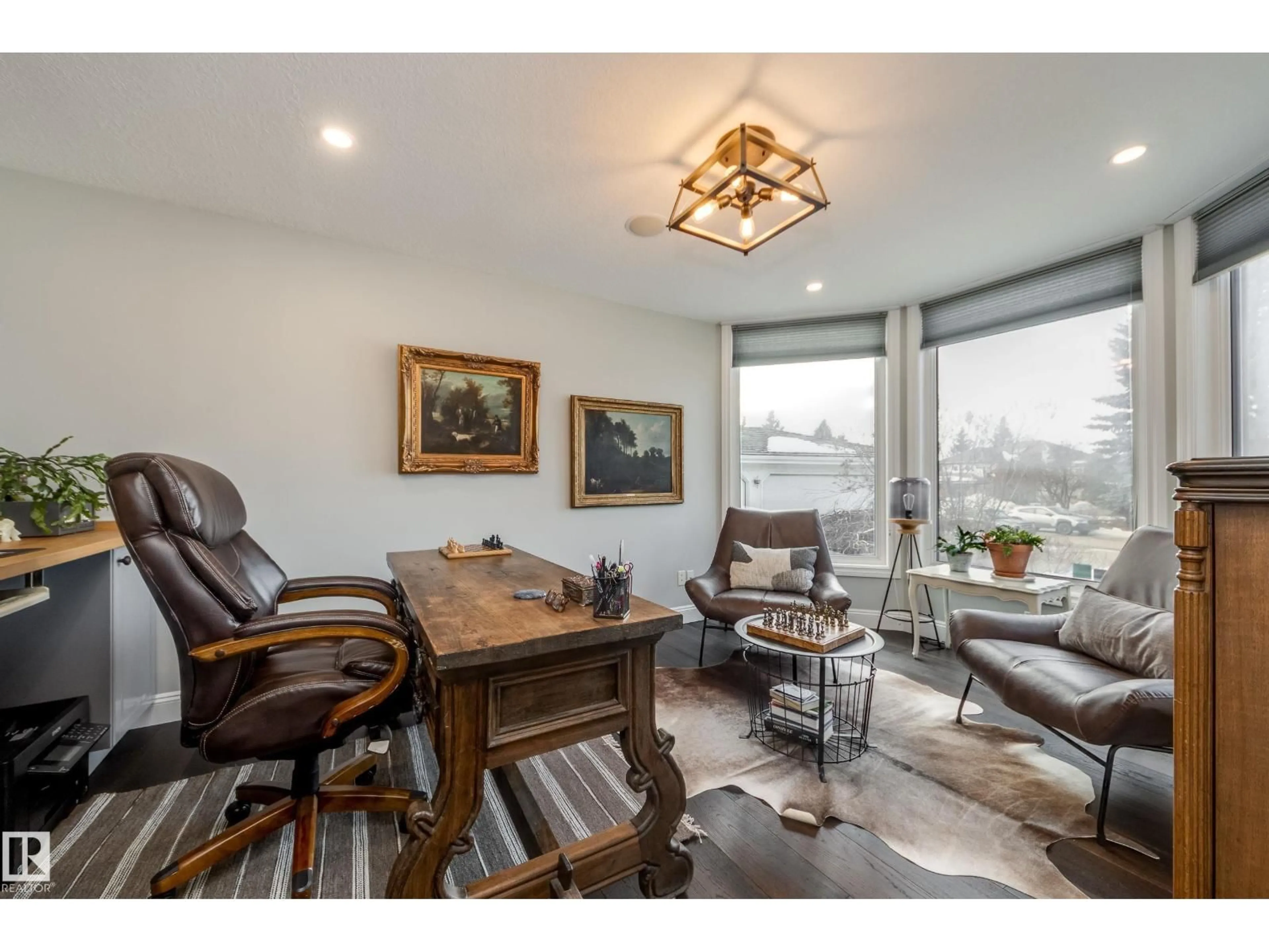 Living room with furniture, wood/laminate floor for 103 WEAVER DR, Edmonton Alberta T6M2J3