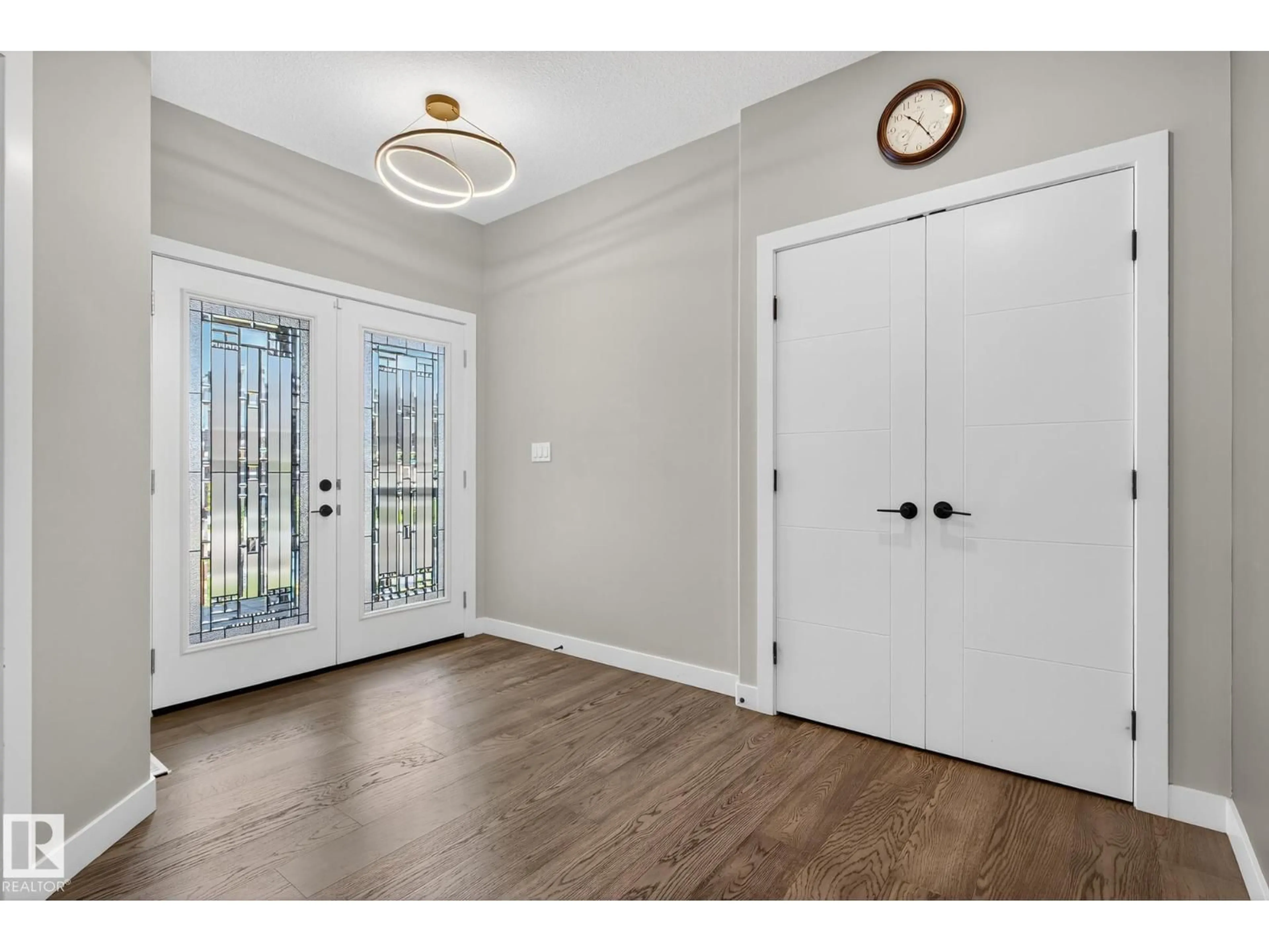 Indoor entryway for 1027 150 AV, Edmonton Alberta T5Y4C1