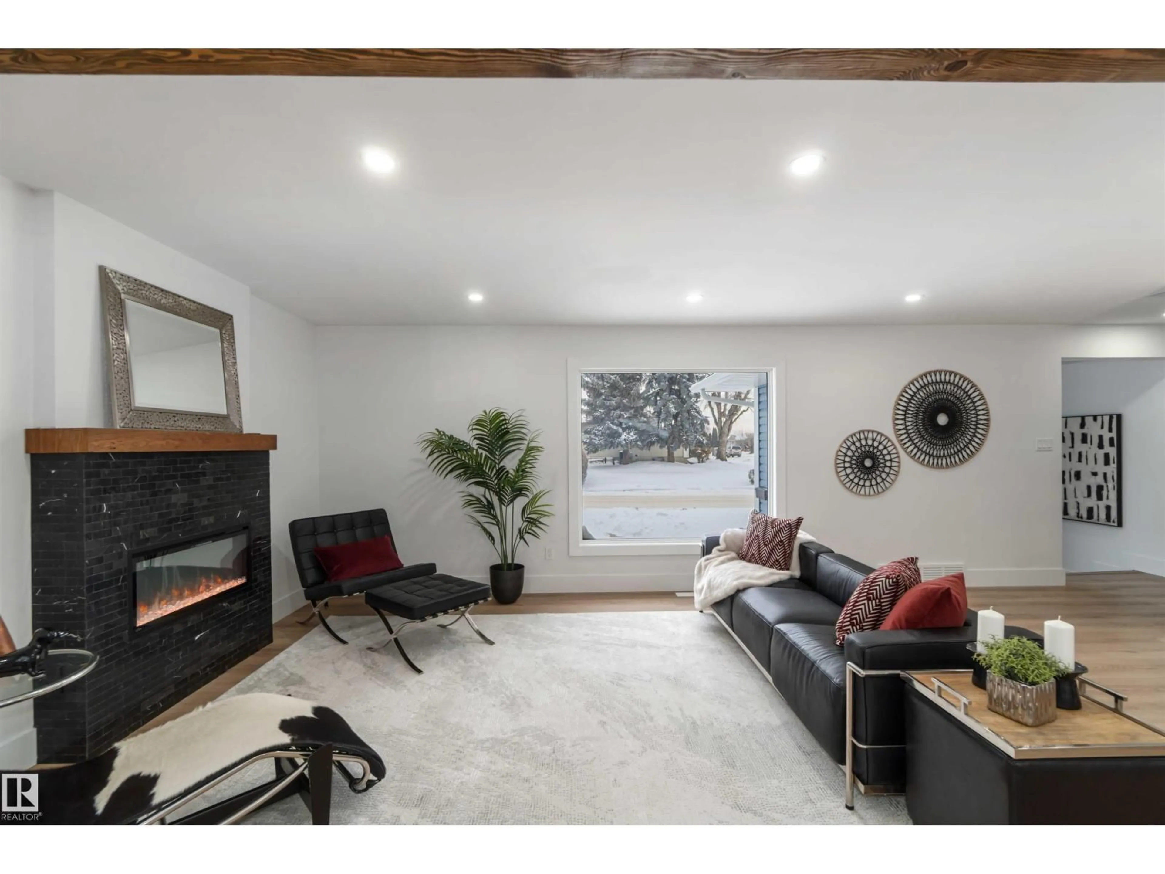 Living room with furniture, unknown for 6719 95 AV, Edmonton Alberta T6B1A6