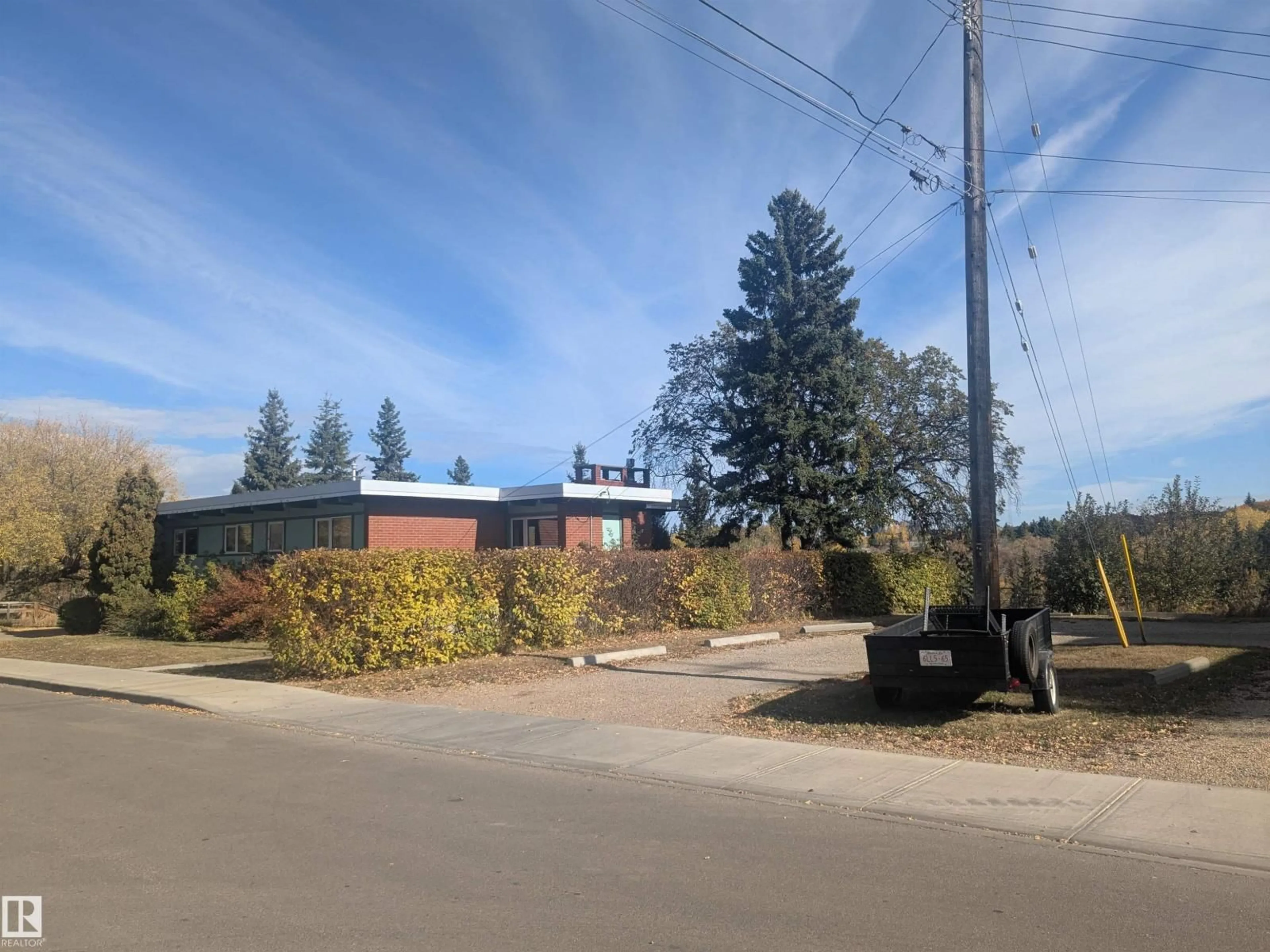 A pic from outside/outdoor area/front of a property/back of a property/a pic from drone, unknown for 8311 96 ST, Edmonton Alberta T6C3Y4