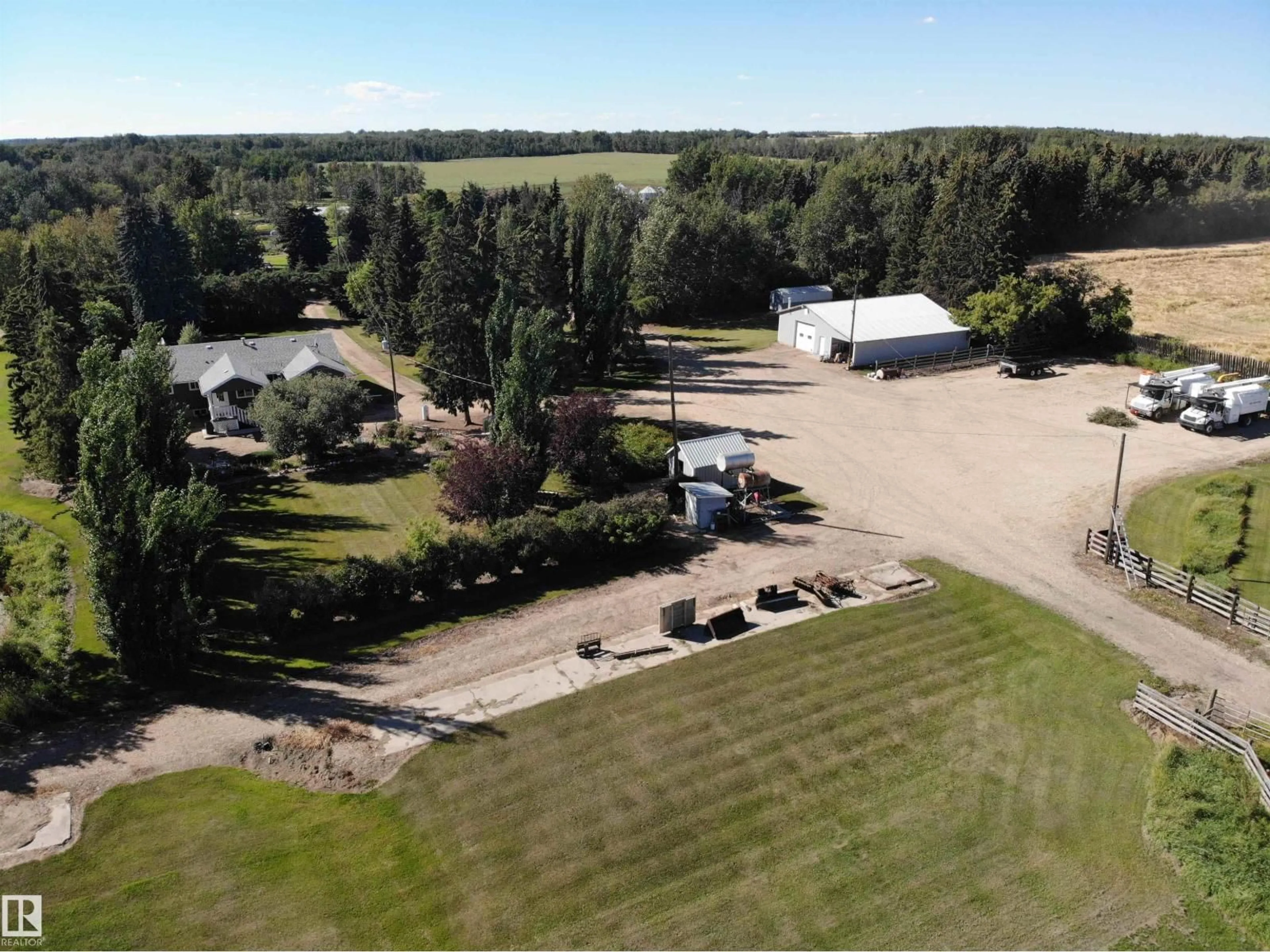 A pic from outside/outdoor area/front of a property/back of a property/a pic from drone, unknown for 59225 RGE RD 31, Rural Barrhead County Alberta T7N1N3