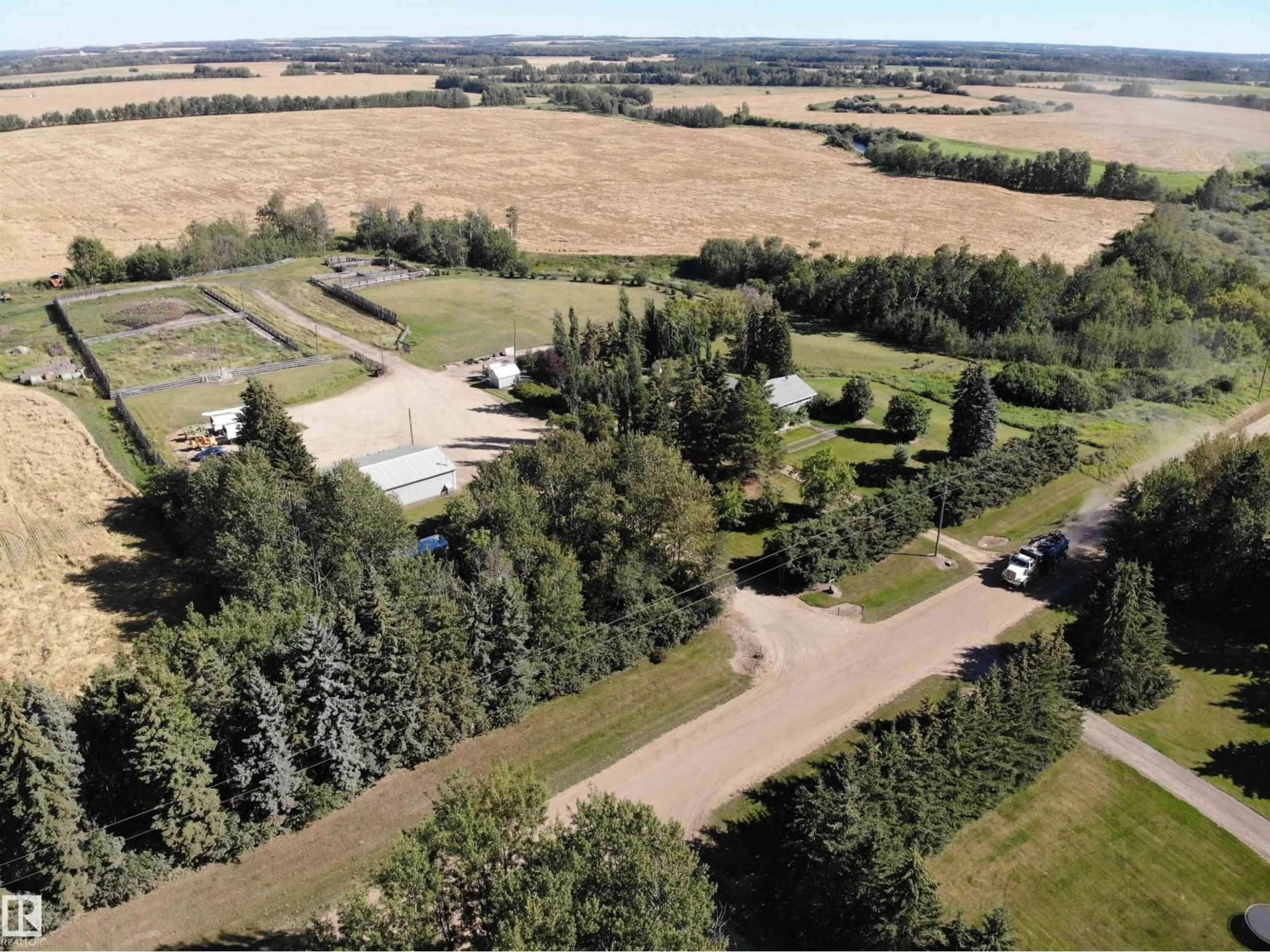 A pic from outside/outdoor area/front of a property/back of a property/a pic from drone, unknown for 59225 RGE RD 31, Rural Barrhead County Alberta T7N1N3