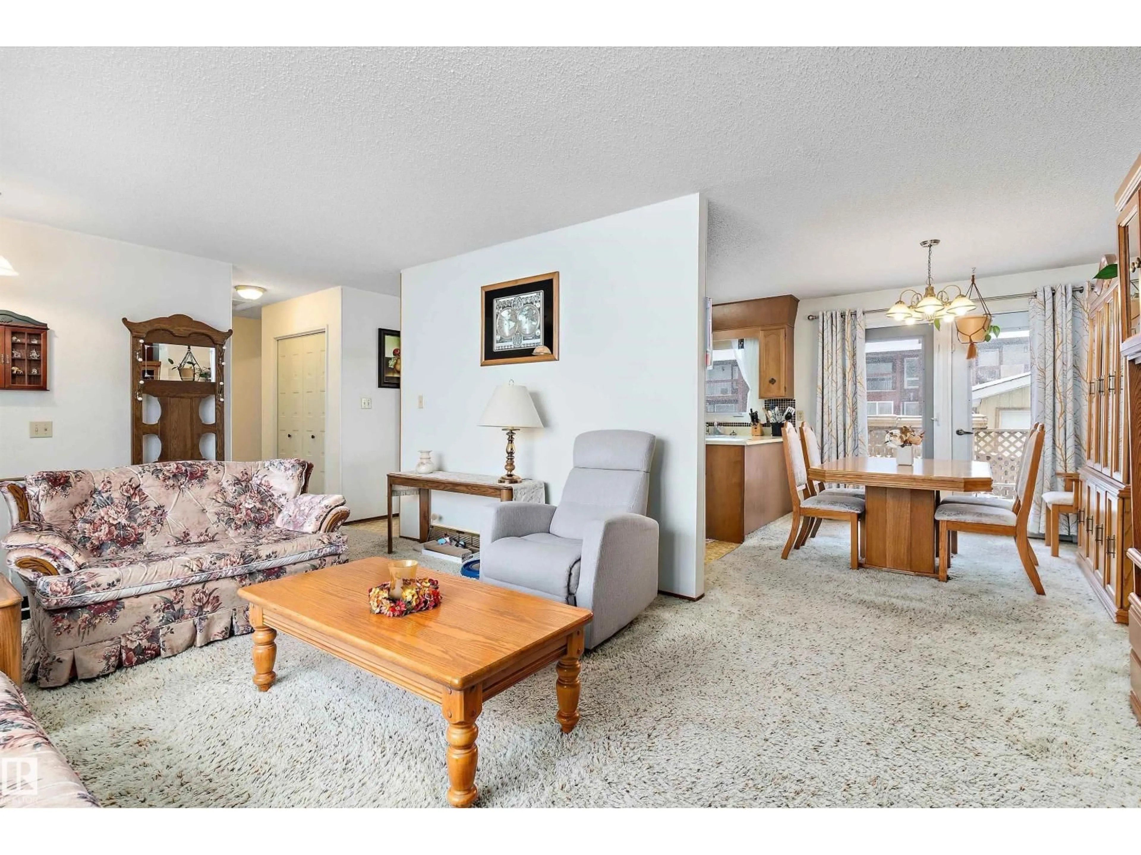 Living room with furniture, unknown for 16016 102 ST, Edmonton Alberta T5X2H1