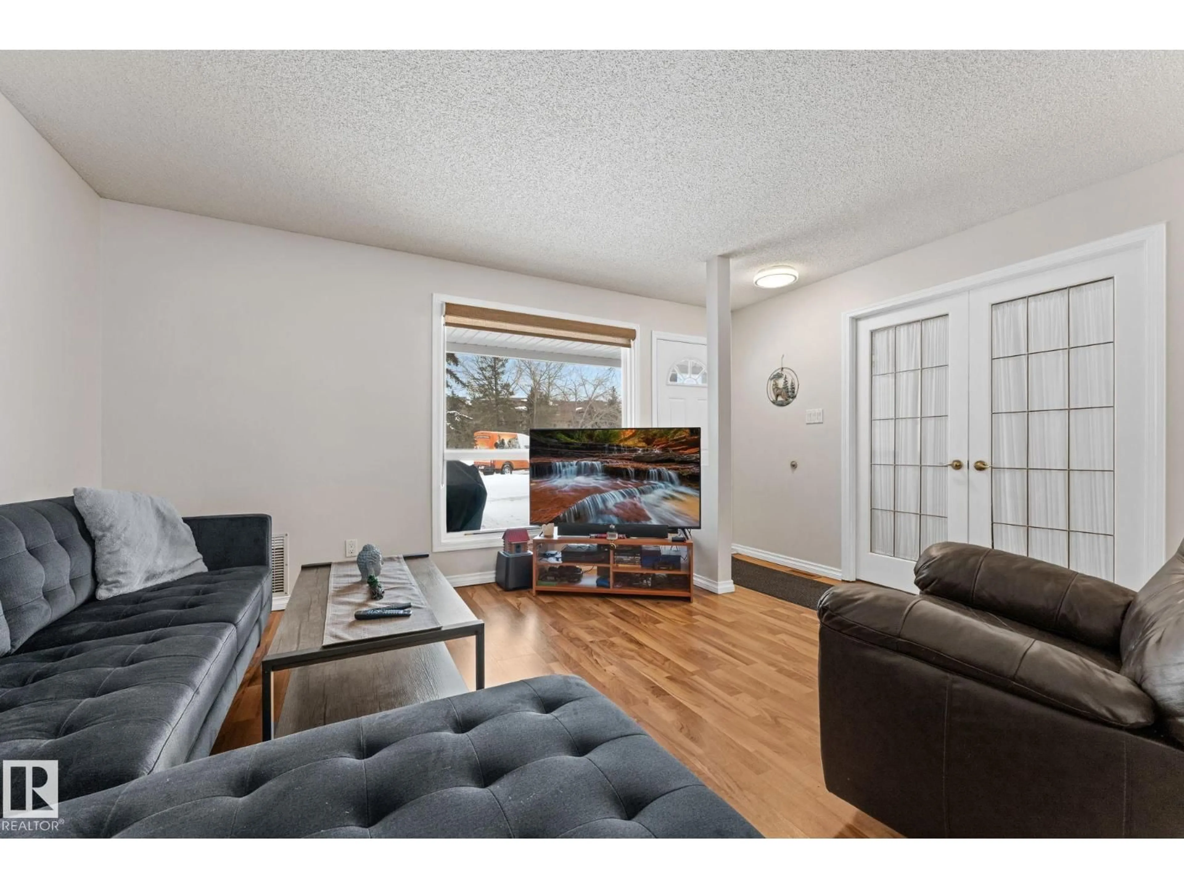Living room with furniture, wood/laminate floor for 36 - 2204 118 ST, Edmonton Alberta T6J5K2