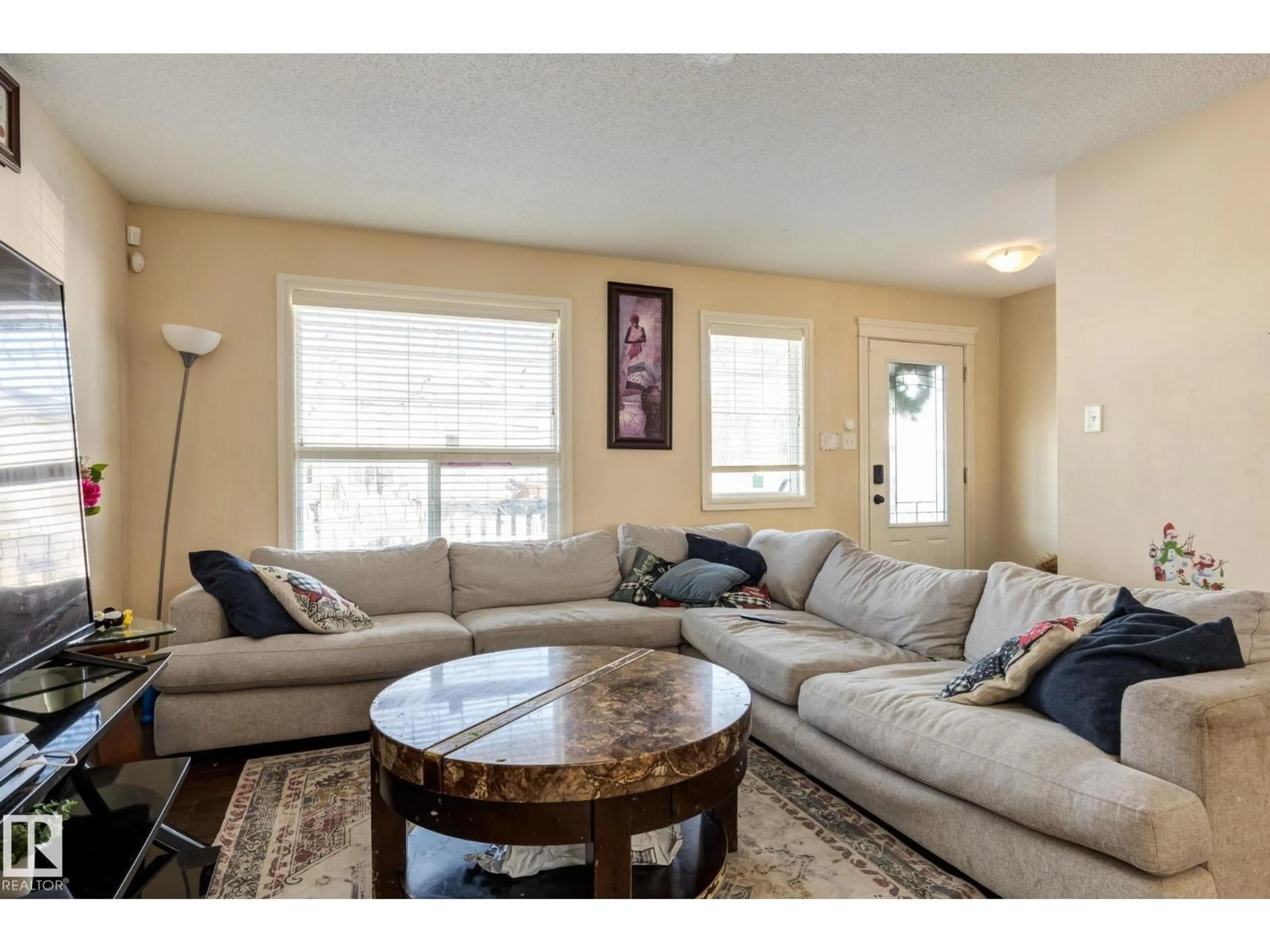 Living room with furniture, unknown for 3039 14 AV, Edmonton Alberta T6T0Z2