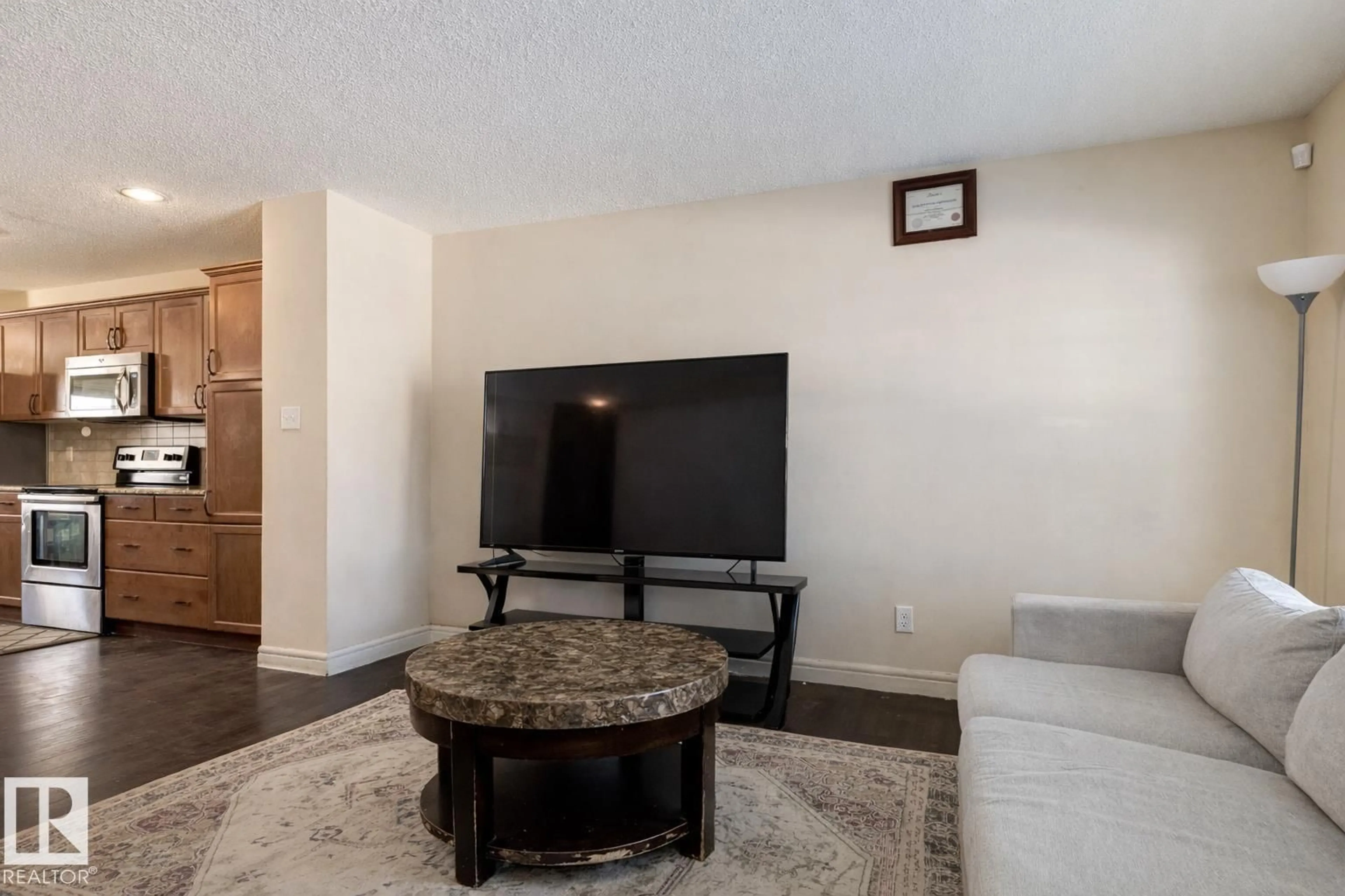 Living room with furniture, unknown for 3039 14 AV, Edmonton Alberta T6T0Z2