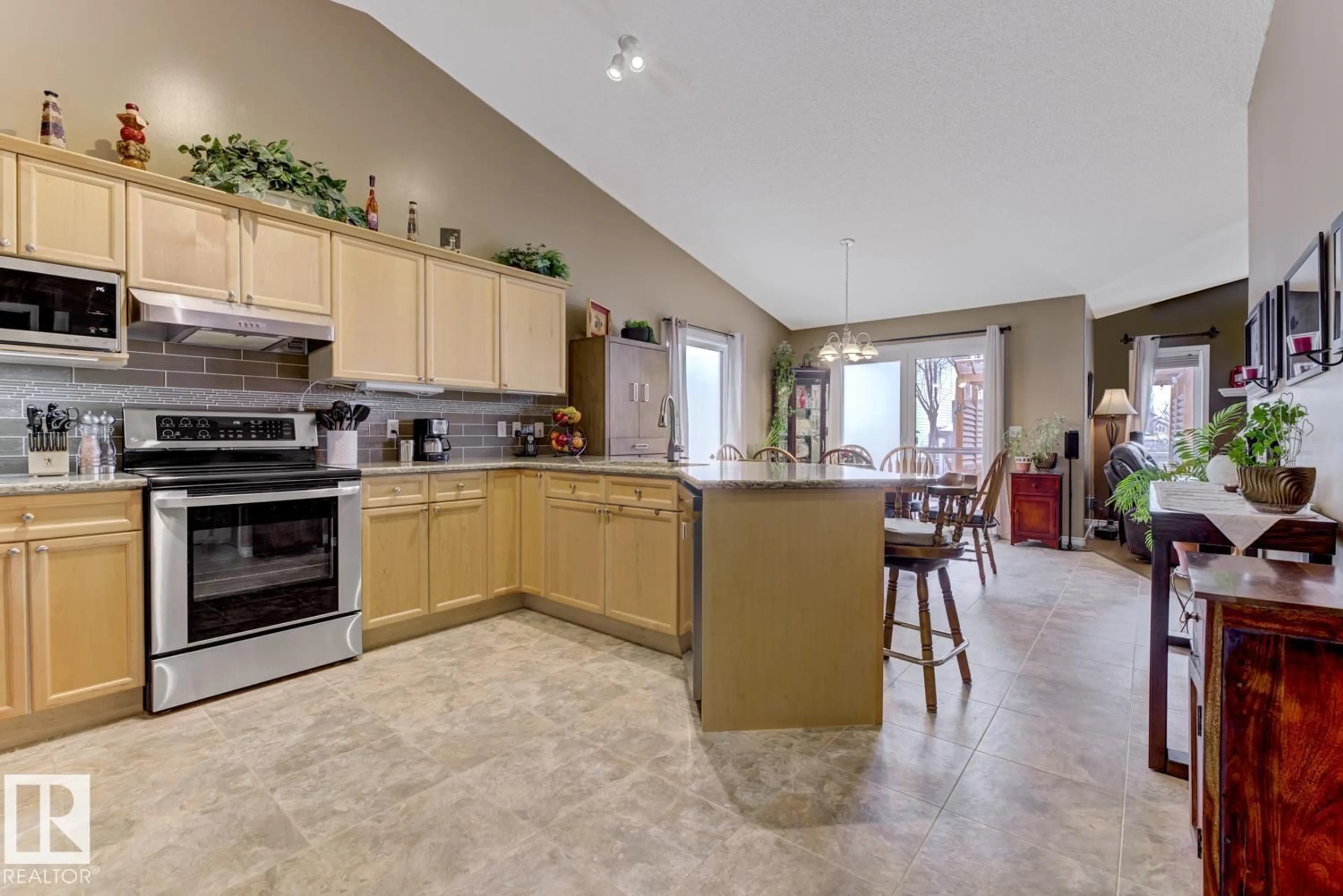 Open concept kitchen, ceramic/tile floor for 20148 46 AV, Edmonton Alberta T6M2Y1