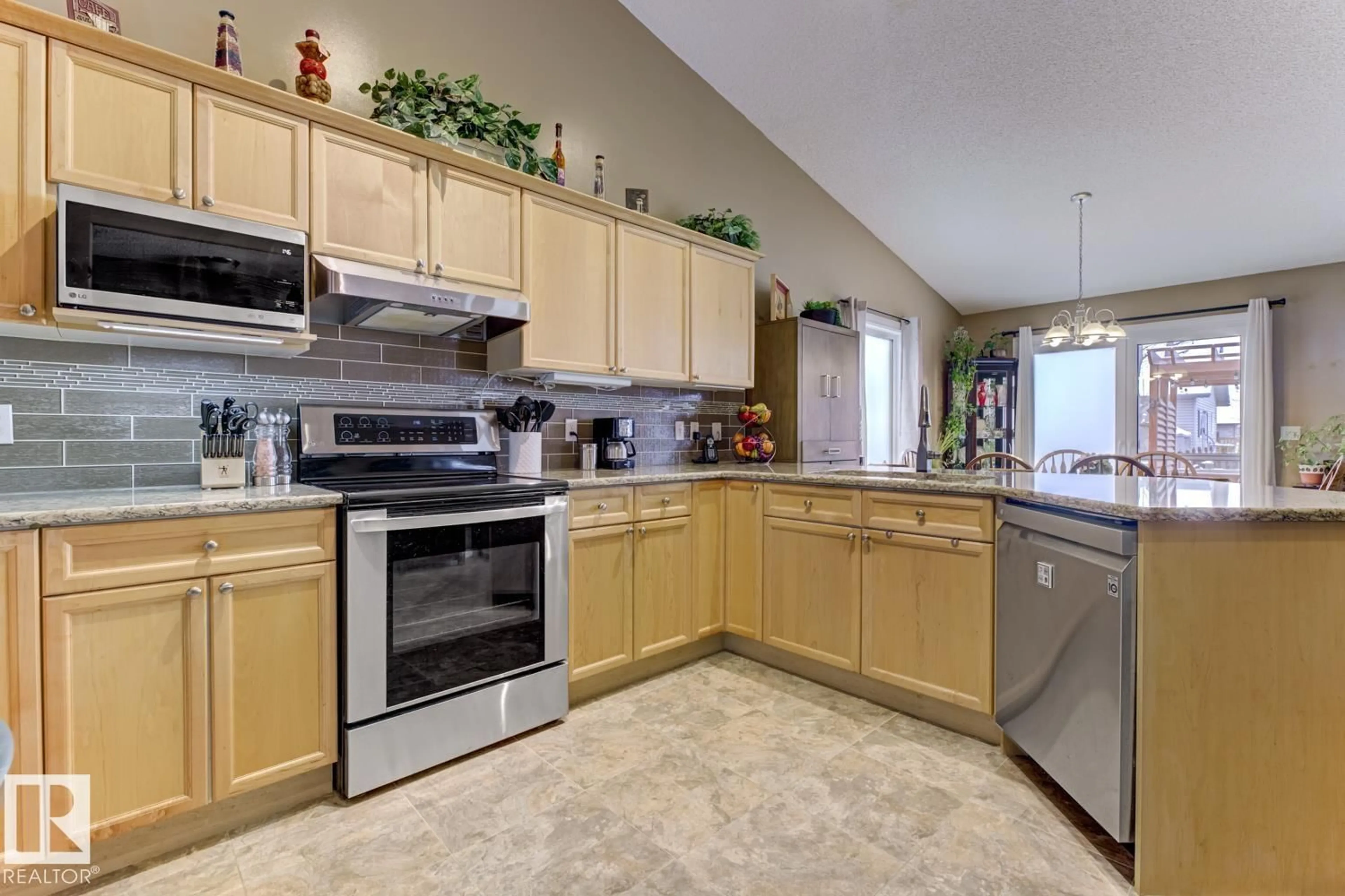 Open concept kitchen, ceramic/tile floor for 20148 46 AV, Edmonton Alberta T6M2Y1