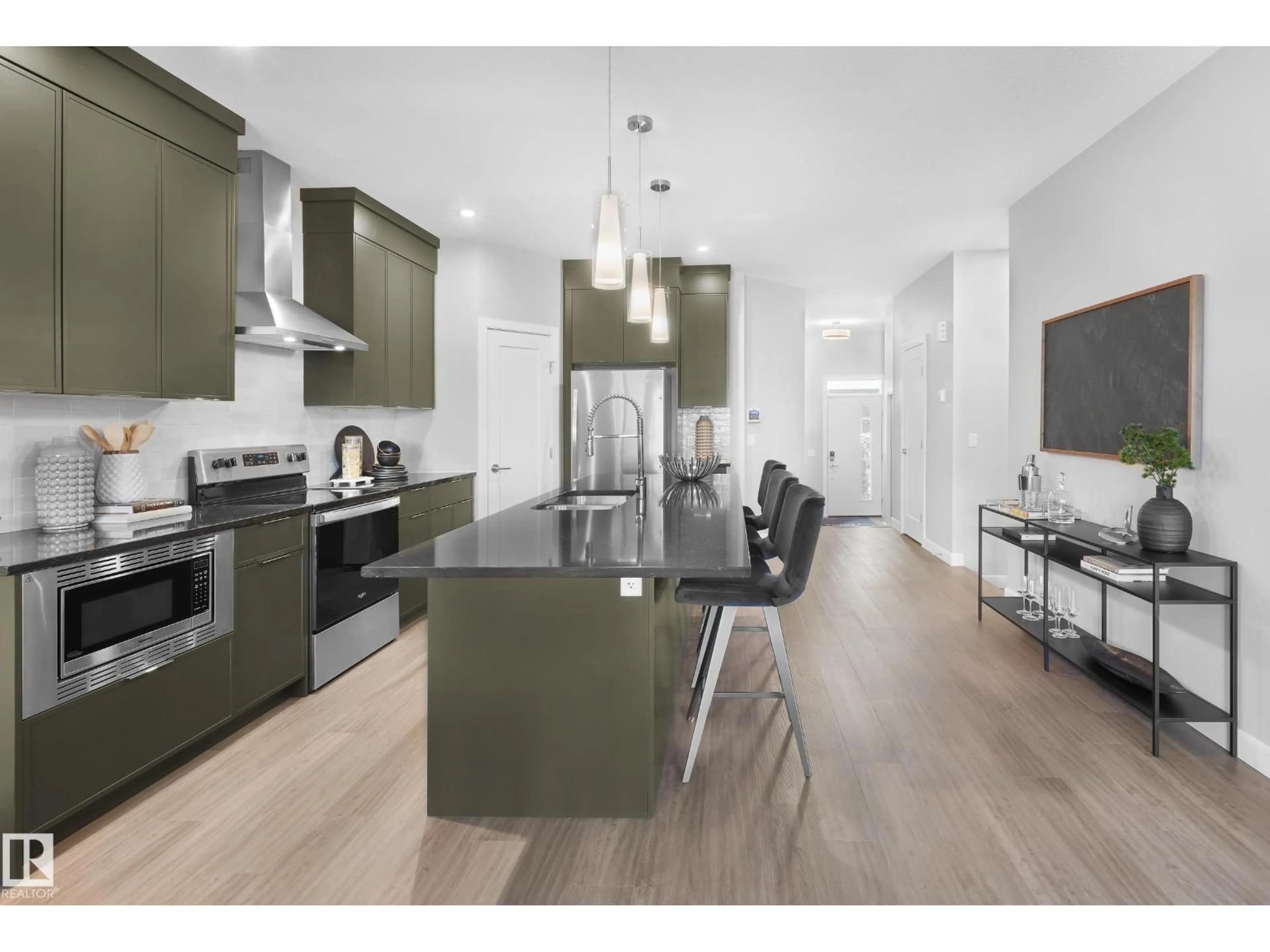 Open concept kitchen, wood/laminate floor for 5637 HAWTHORN WY, Edmonton Alberta T6X3K7