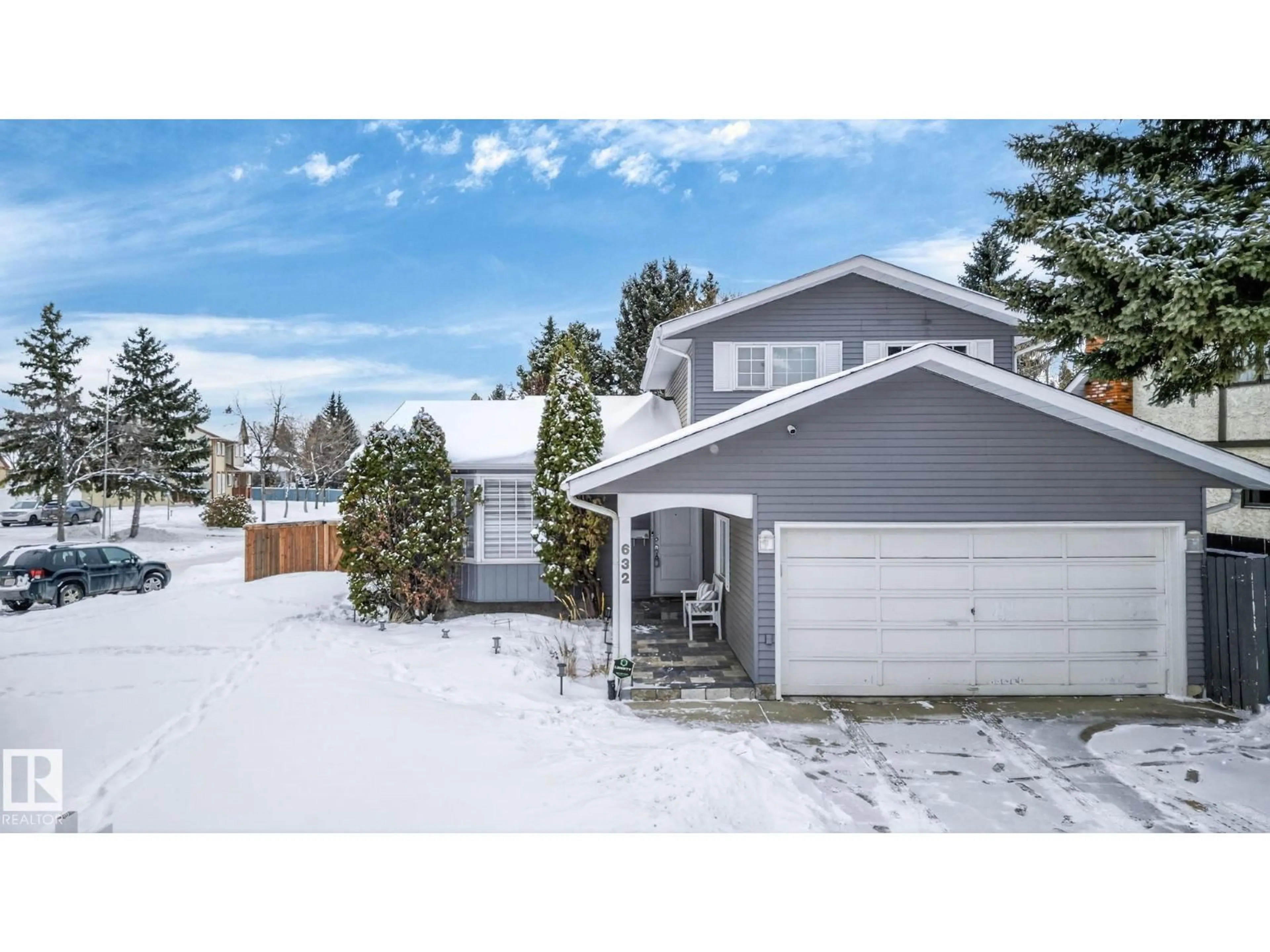 Home with vinyl exterior material, street for 632 WAHSTAO RD, Edmonton Alberta T5T2Y4