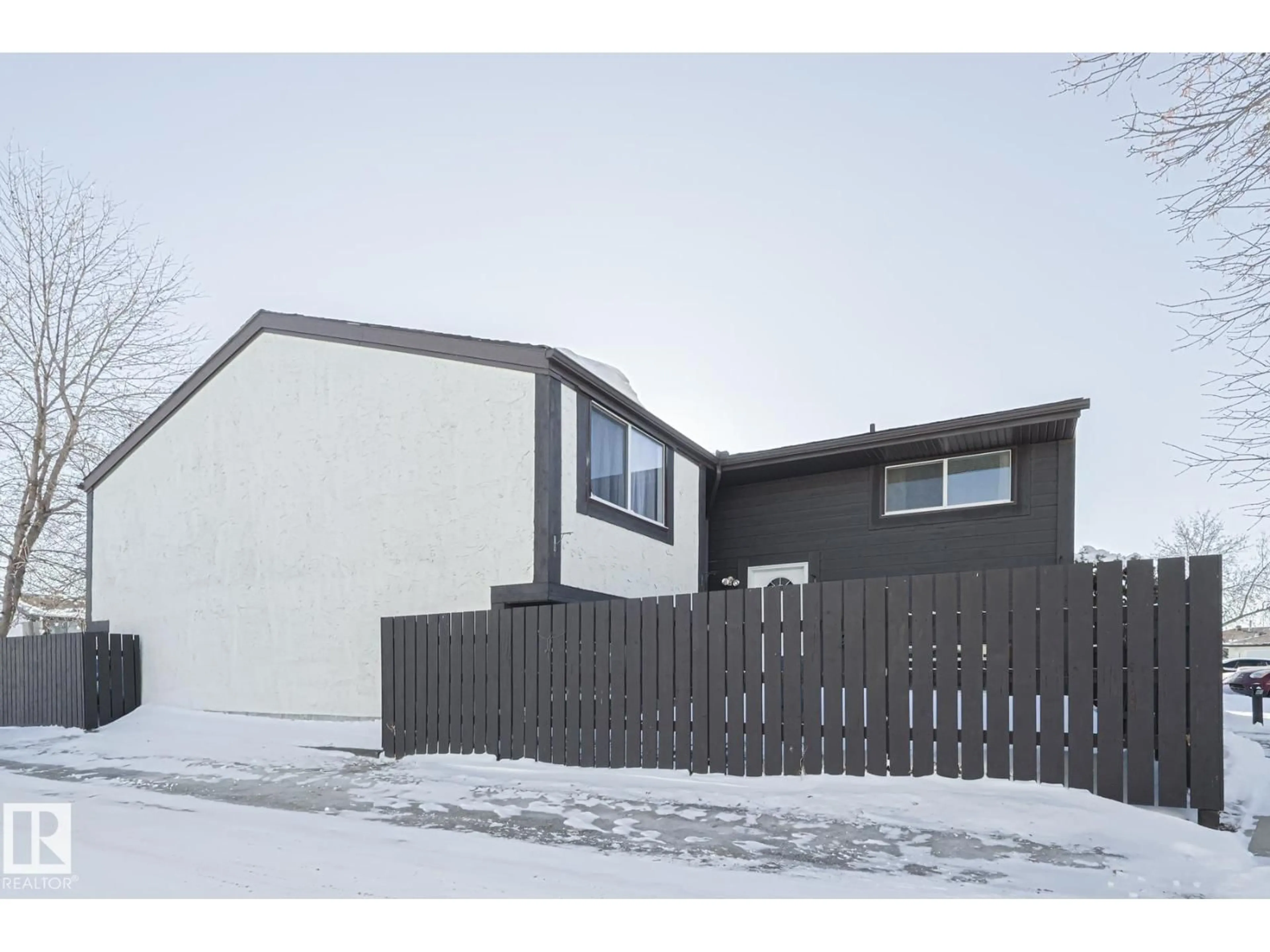 Home with vinyl exterior material, street for 1526 69 ST, Edmonton Alberta T6K3R3