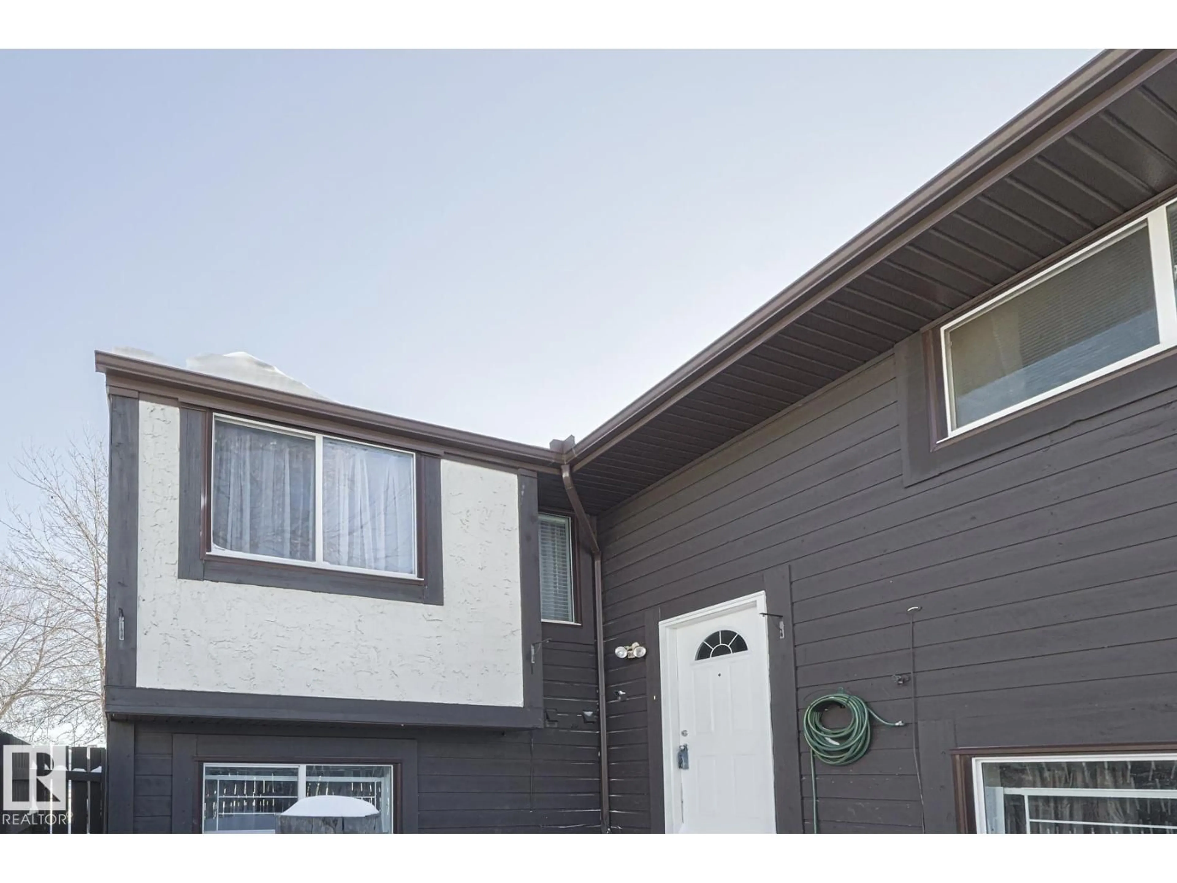 Home with vinyl exterior material, street for 1526 69 ST, Edmonton Alberta T6K3R3