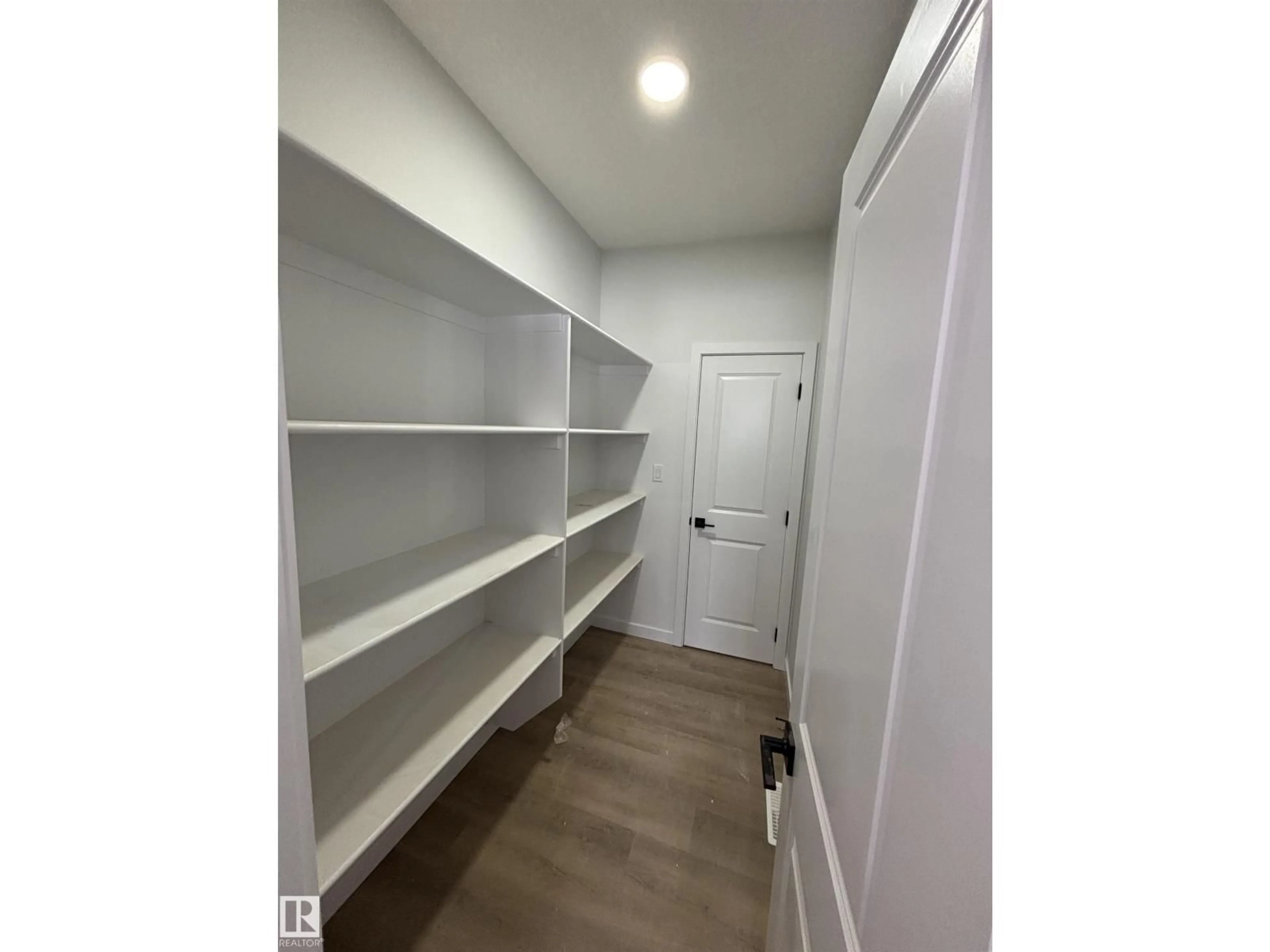 Storage room or clothes room or walk-in closet for LI NW - 1527 SISKIN LINK, Edmonton Alberta T5S0T9